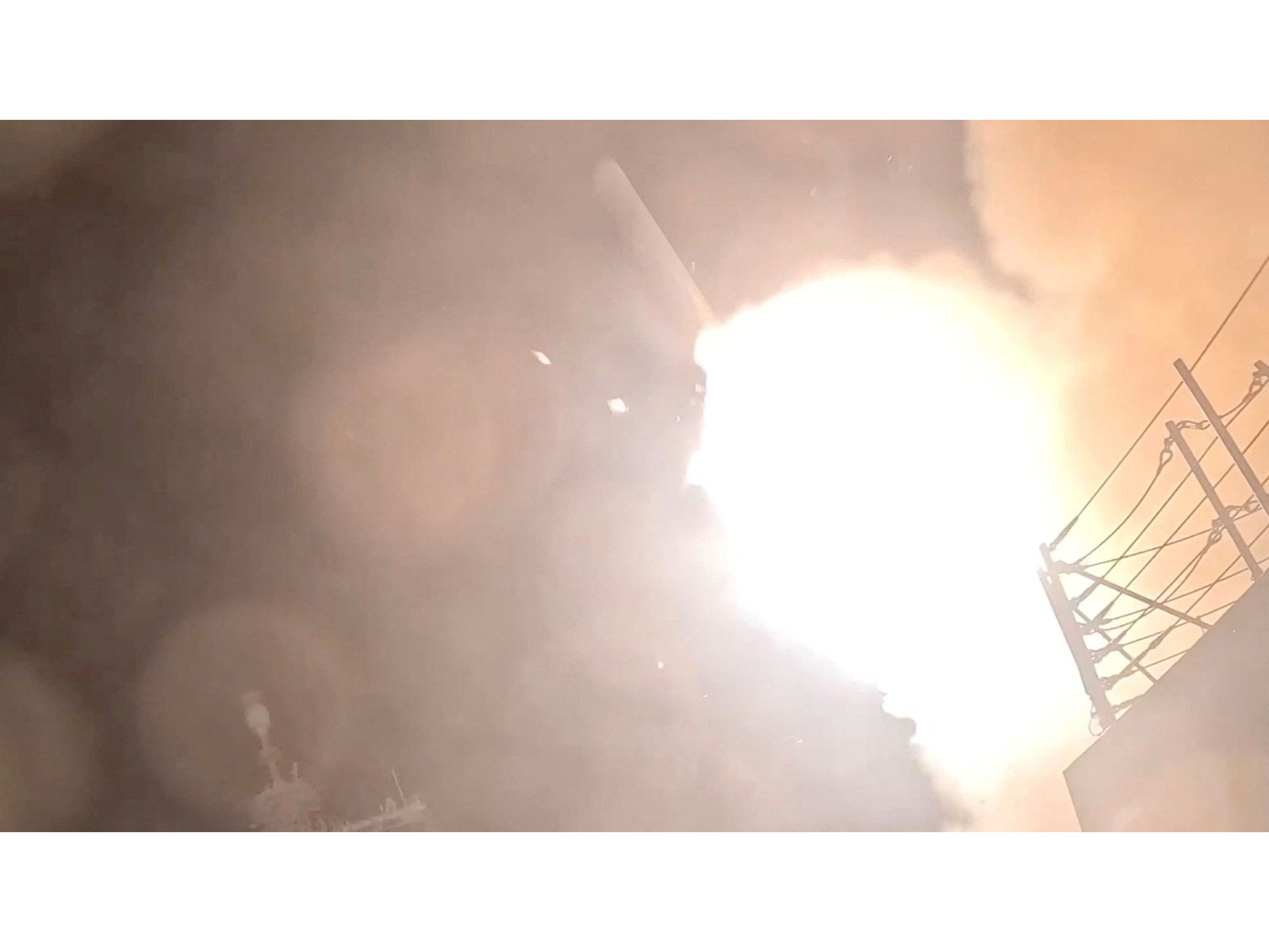 A munition is launched from a US warship at an unknown location, during what US Central Command (CENTCOM) says are strikes on Iran(Photo/Reuters)