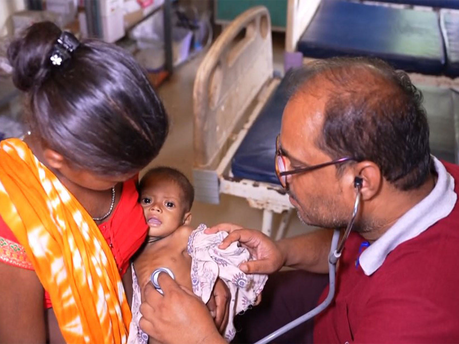 Visual of a doctor treating an infant in Sukma (Photo/ANI) 