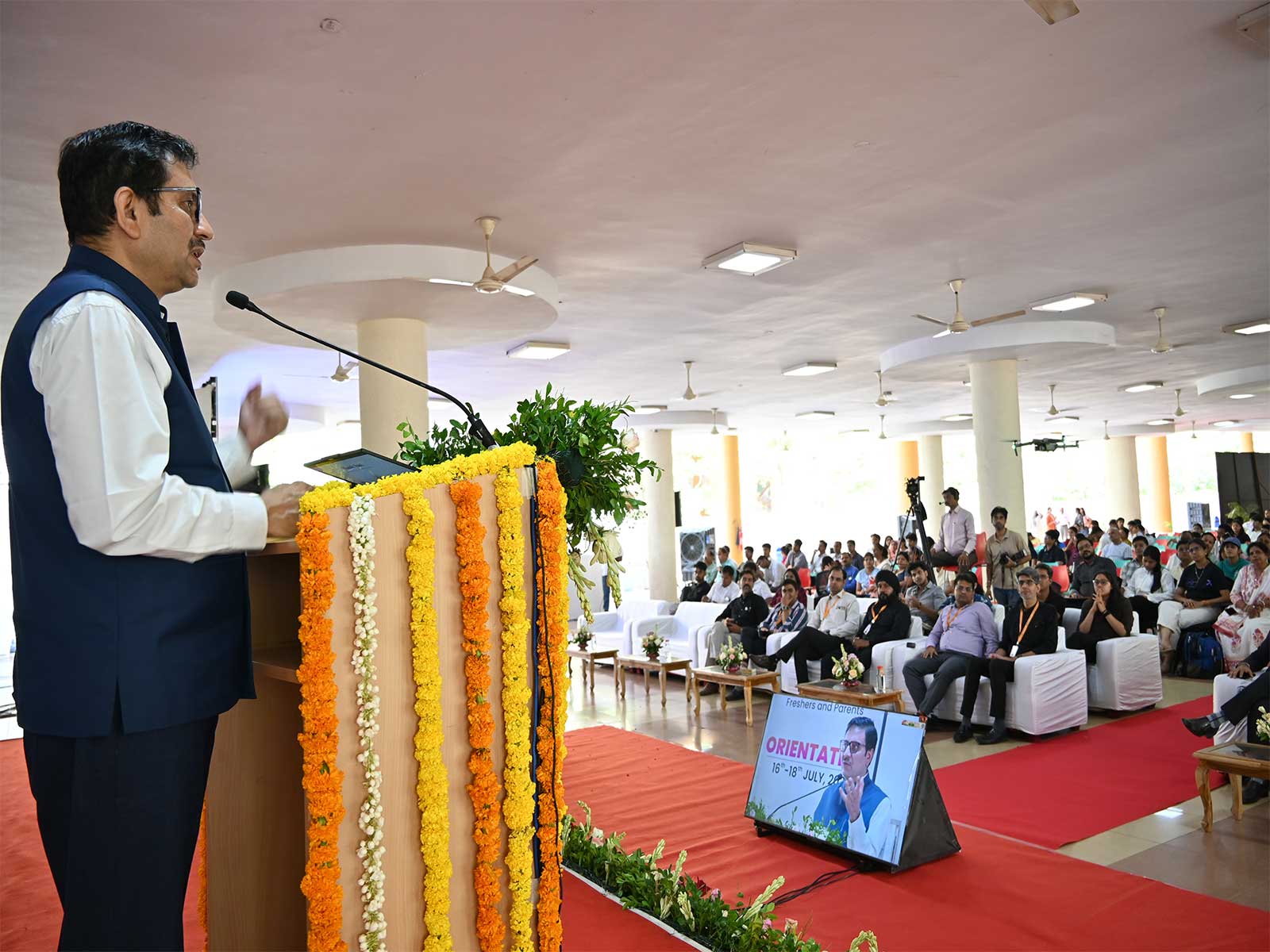 President Dr N N Sharma addressing the new students and their parents
