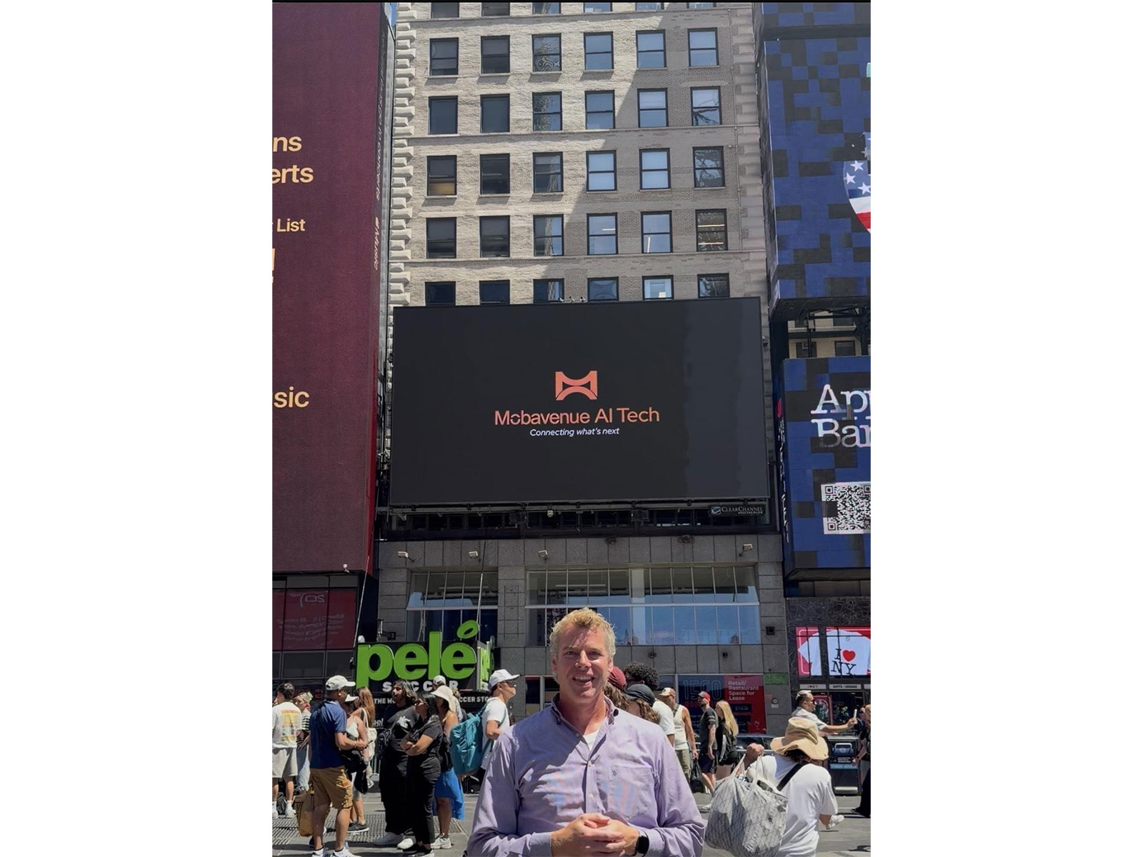Mobavenue AI's new brand identity displayed at Times Square with Eric Lind, Country Head (Photo/Mobavenue AI)