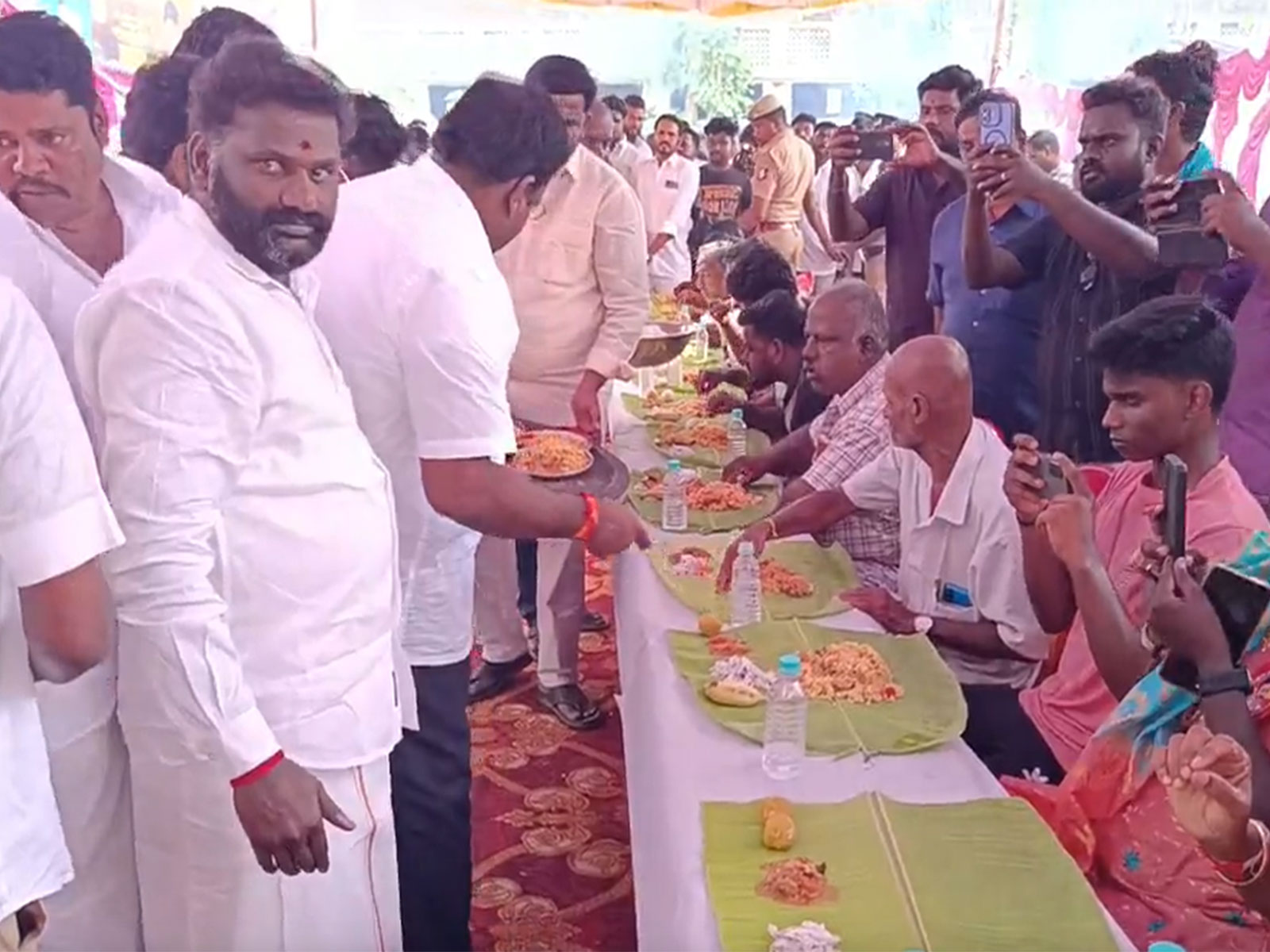 Tamil Nadu Ministers serve biryani, distribute saplings in Kanchipuram as fans celebrate release of CM Vijay's final film 'Jana Nayagan' (Photo/ANI))