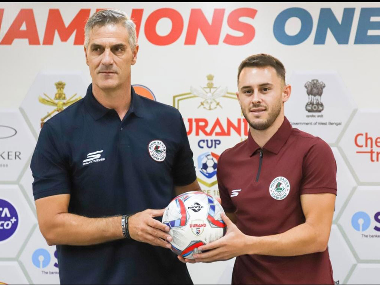 Panagiotis Dilmperis, Head Coach, Mohun Bagan Super Giant, and Dejan Drazic, player, Mohun Bagan Super Giant, pose with the official match ball of the 135th Durand Cup during the official pre-match press conference. (Photo: Durand Cup)