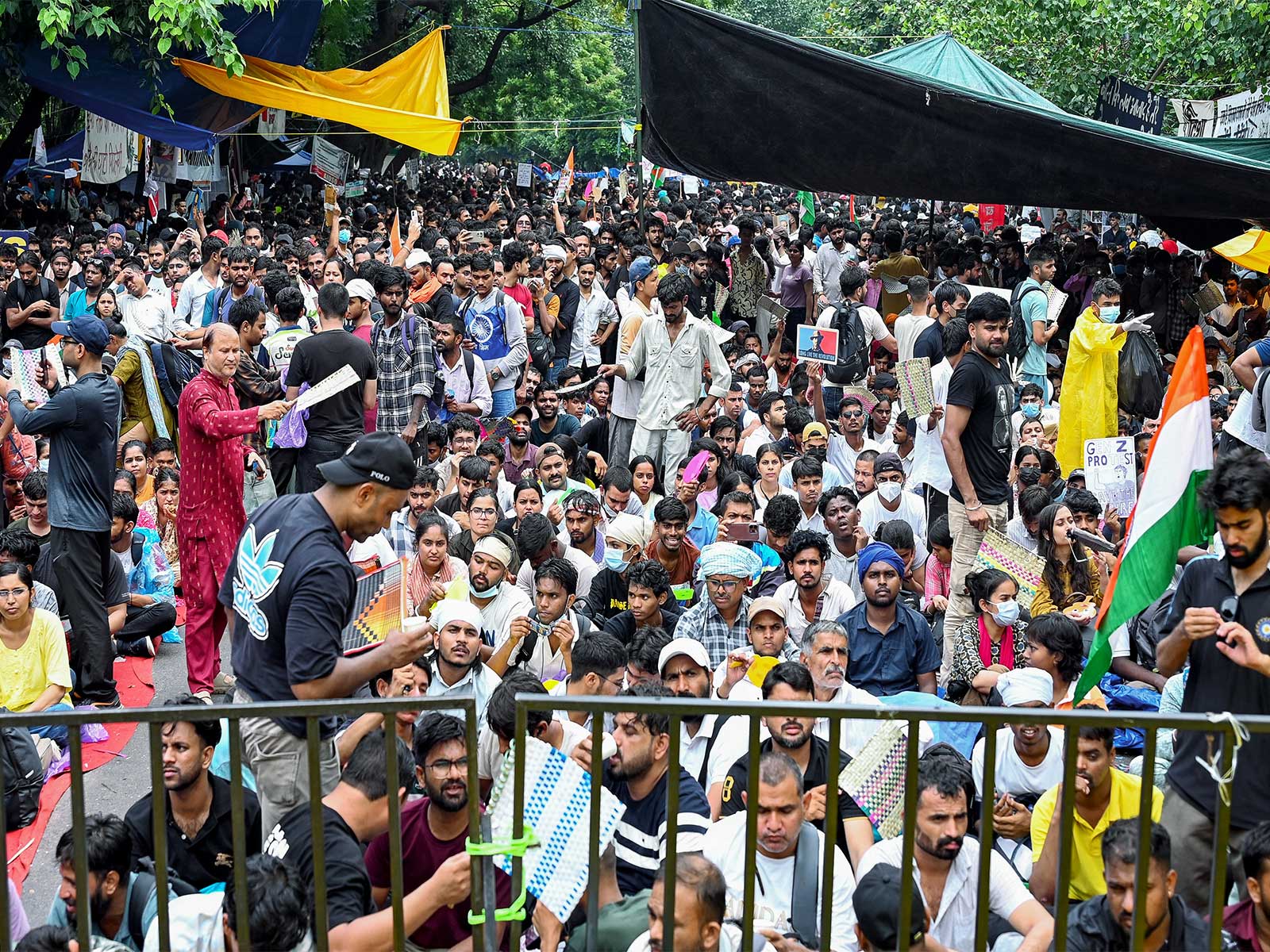 People sit at protest site at Jantar Mantar supporting CJP's protest. (Photo/ANI)