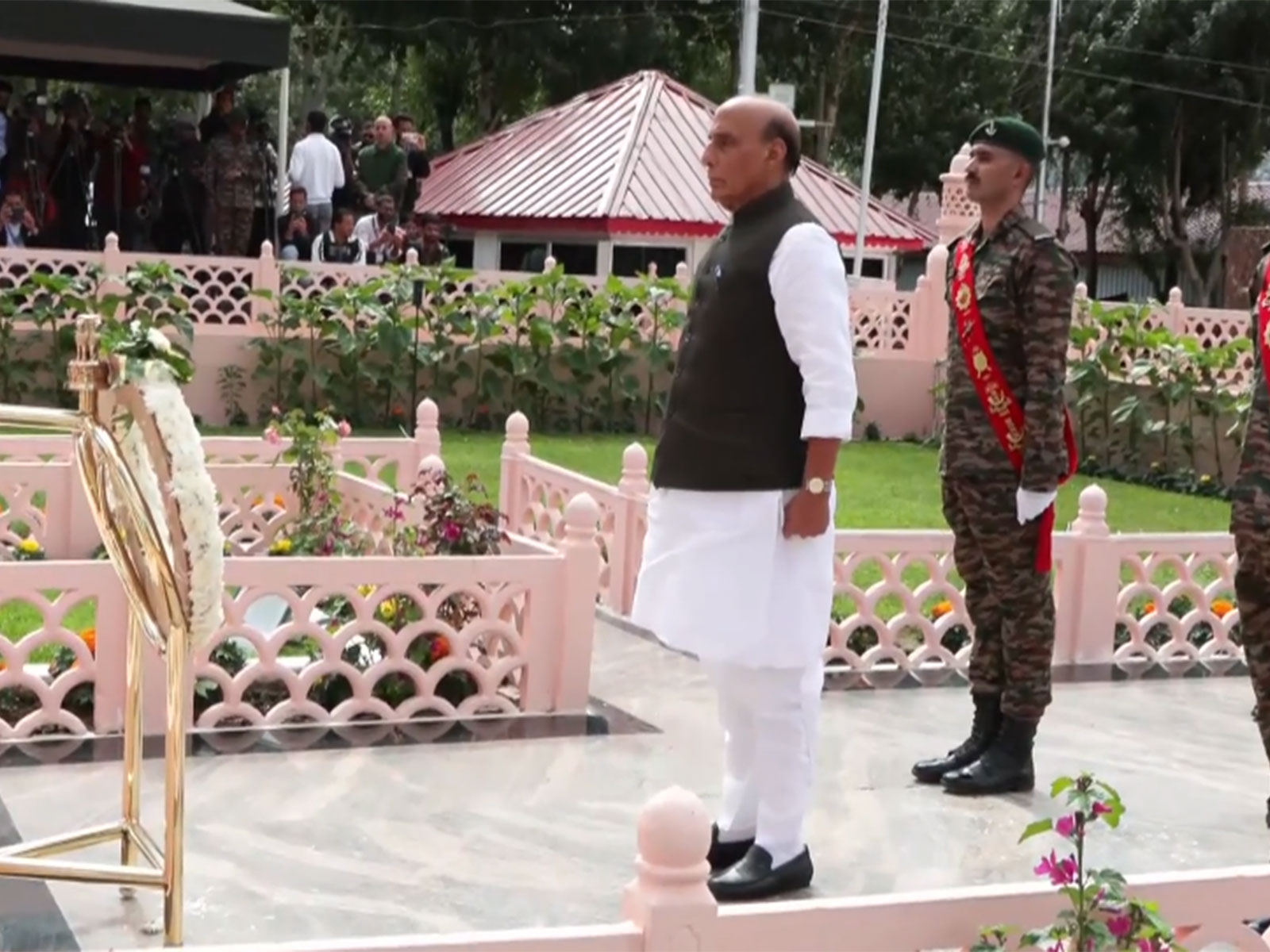 Defence Minister Rajnath Singh paying tributes to soldiers at Kargil War Memorial (Photo/ANI)