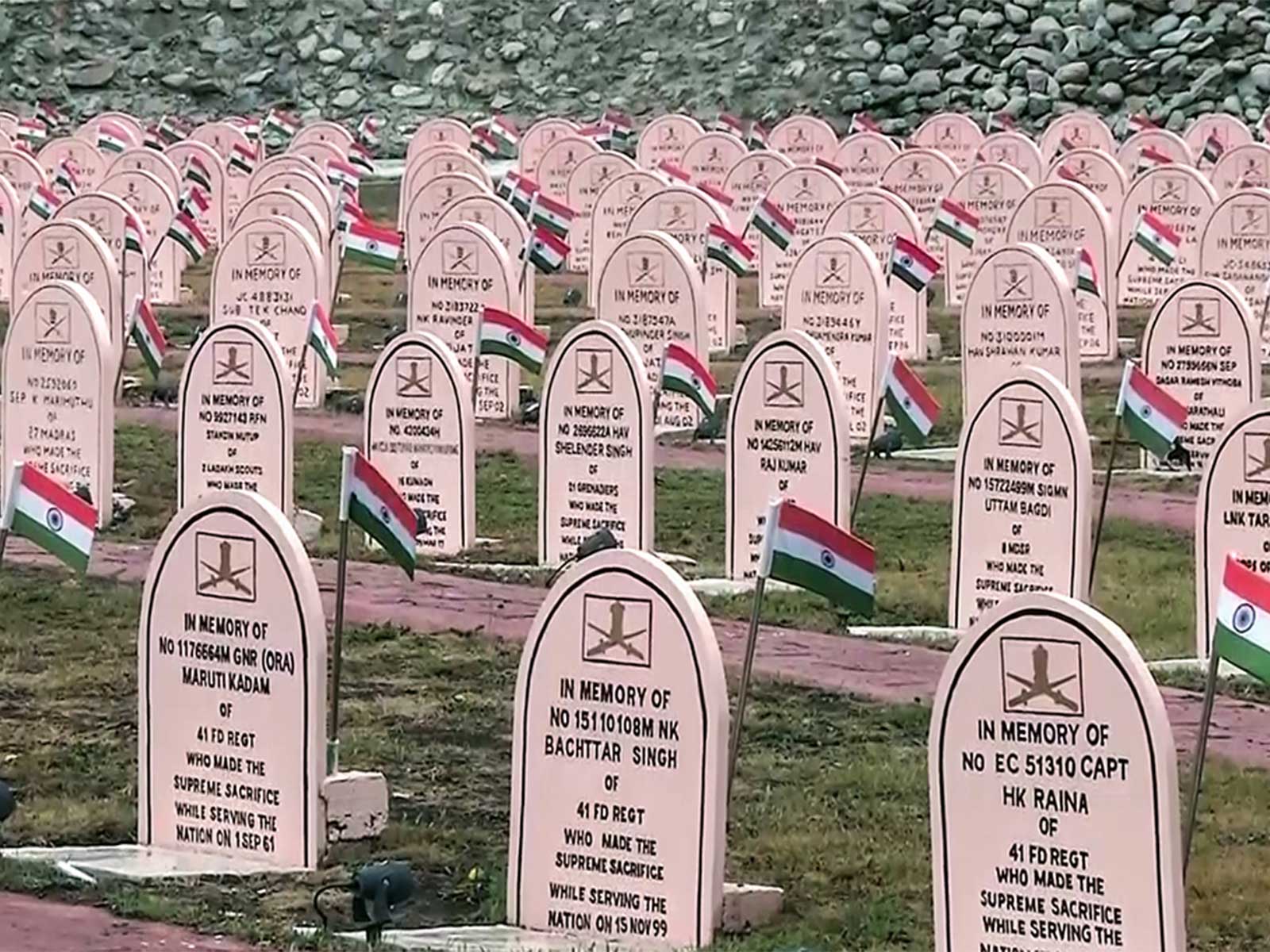 Rows of memorial headstones adorned with the National Flag at the war memorial (Photo: ANI)