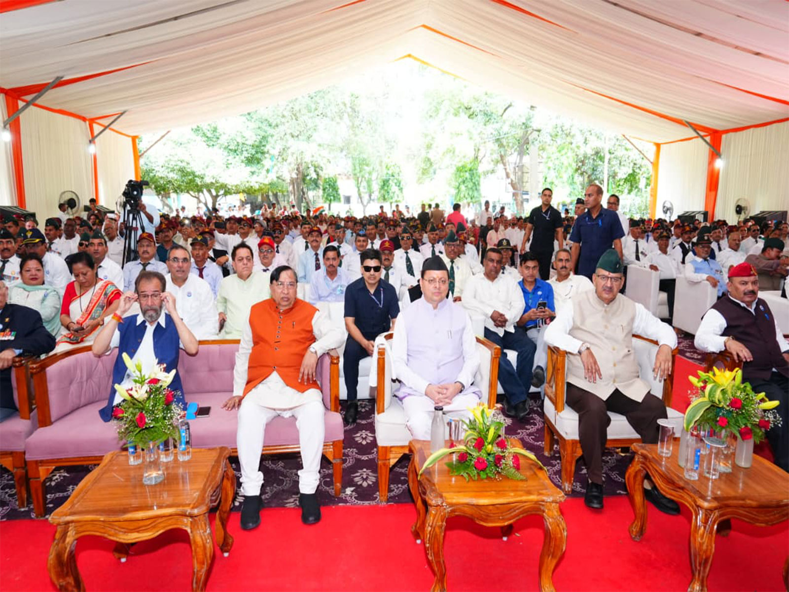CM Dhami listens to Mann Ki Baat with ex-servicemen (Photo/Uttarakhand CMO) 
