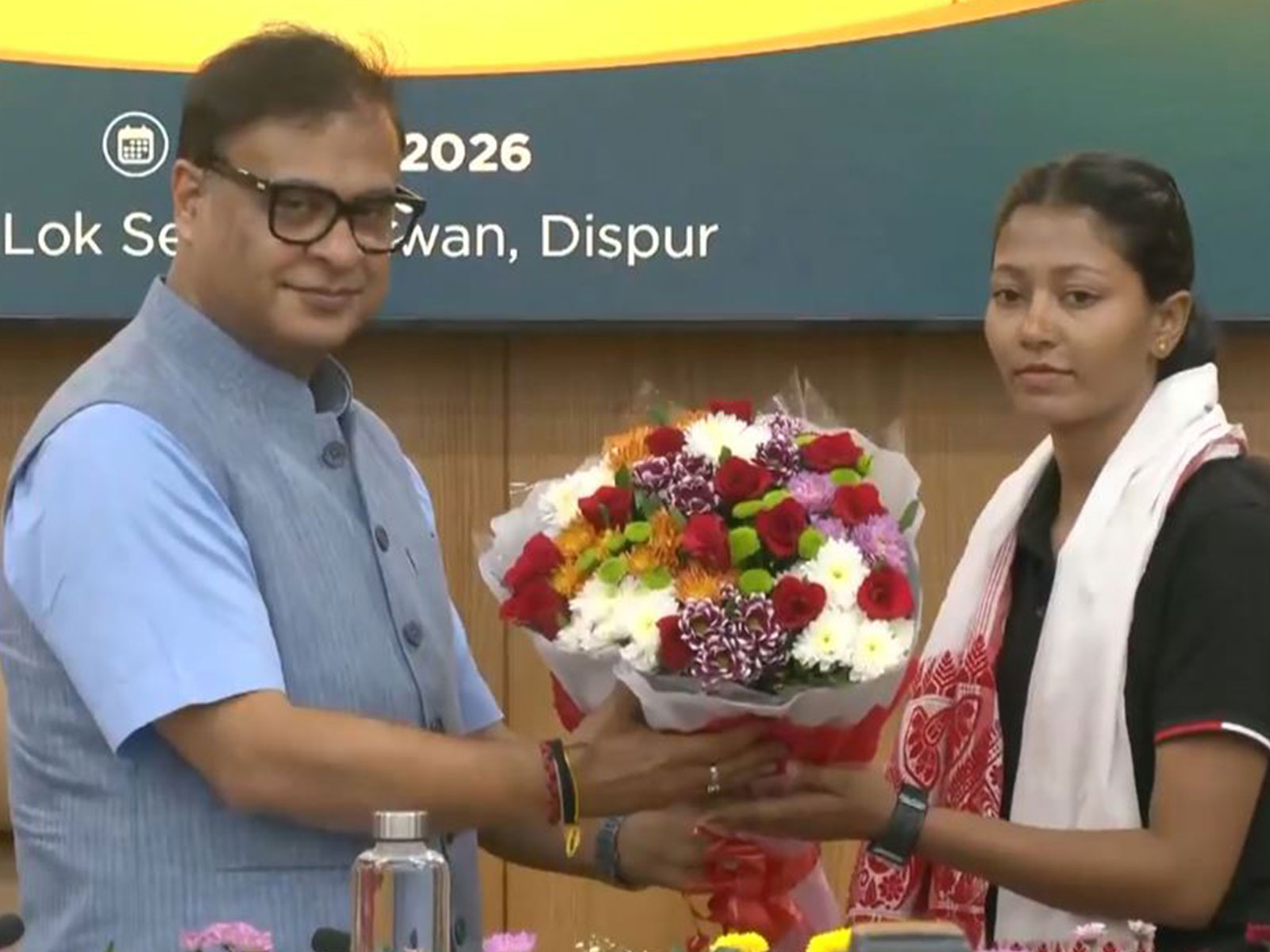 CM Himanta Biswa Sarma felicitates Rupamoni Gorh. (Photo/ANI)