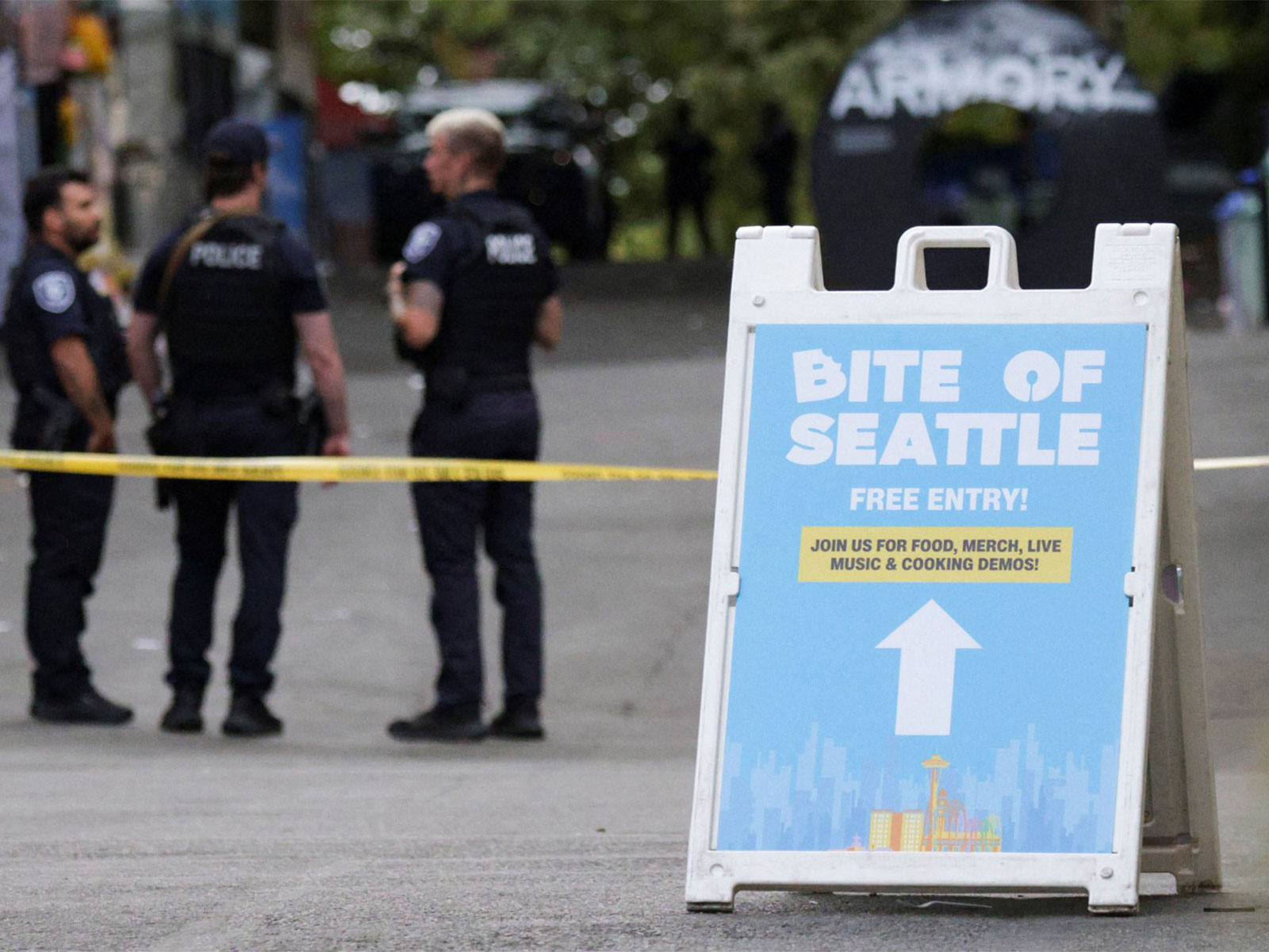 Police officers stand guard at a site after Seattle Police responded to what they described as a shooting with "multiple" victims at Seattle Center (Photo/Reuters)