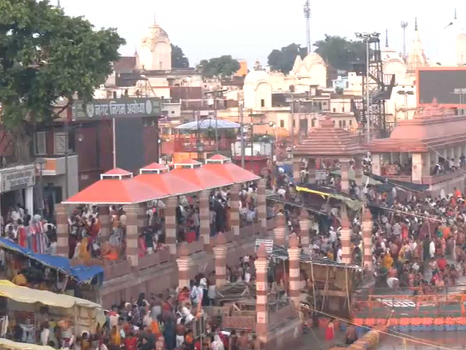 Devotees take a holy dip at the Saryu Ghat on the occasion of Guru Purnima. (Photo/ANI)