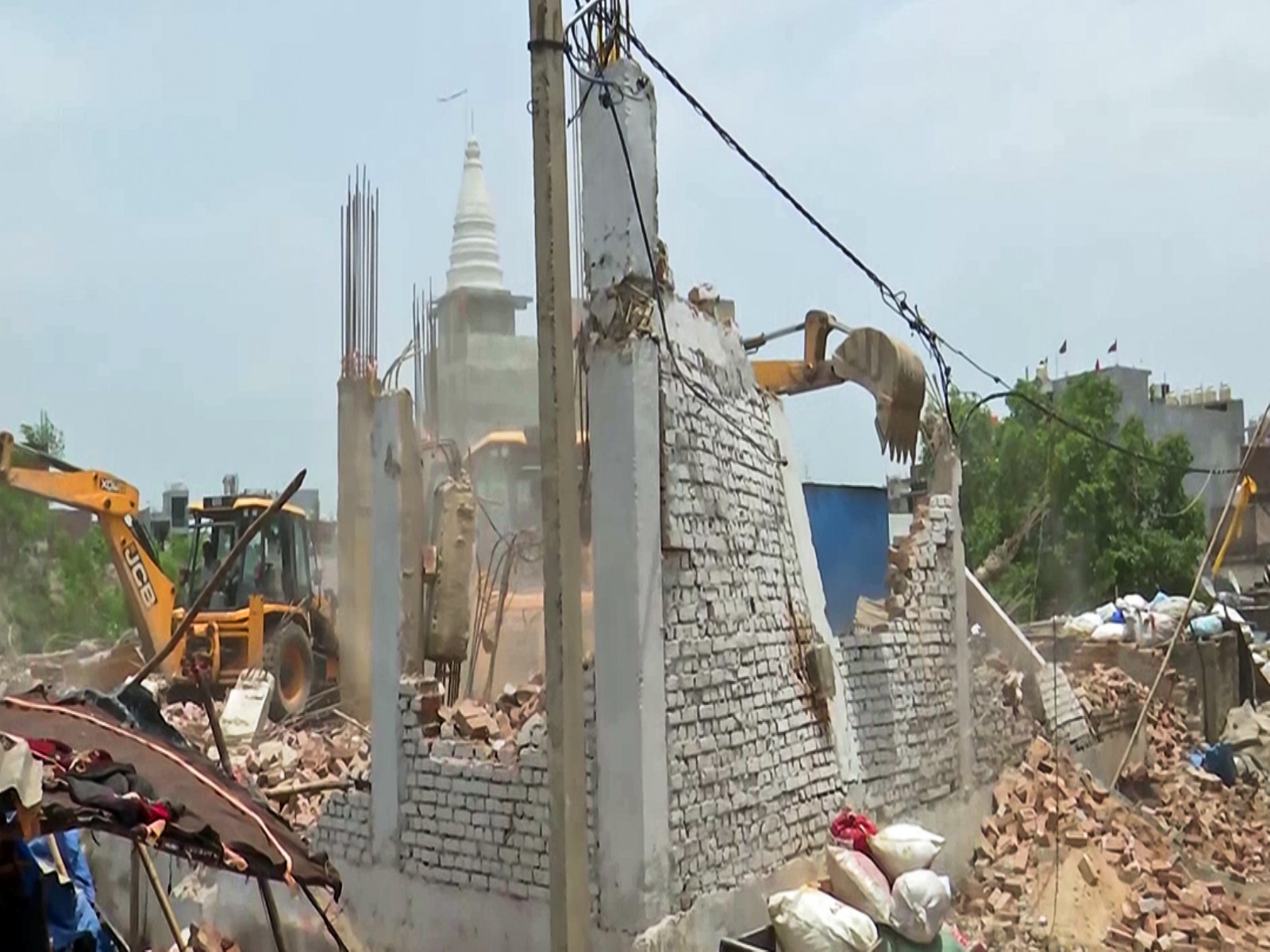 MCD conducts a demolition drive in the Jagatpuri area to remove unauthorised structures and encroachments (Photo/ANI)