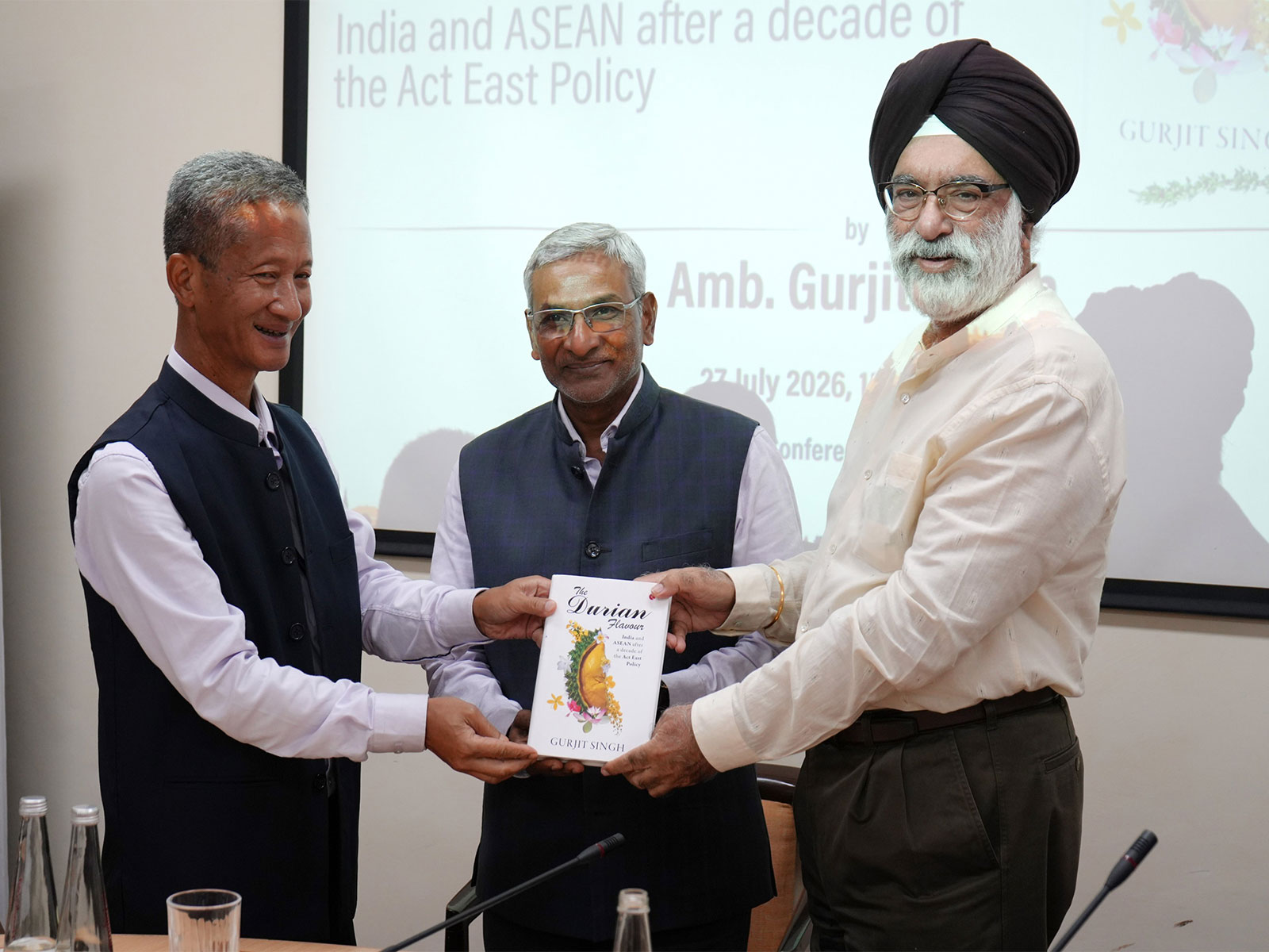 Former Indian diplomat Gurjit Singh (Right), holding his book 'The Durian Flavour: India-ASEAN After a Decade of the Act East Policy' (Photo/X/@ICWA_NewDelhi)