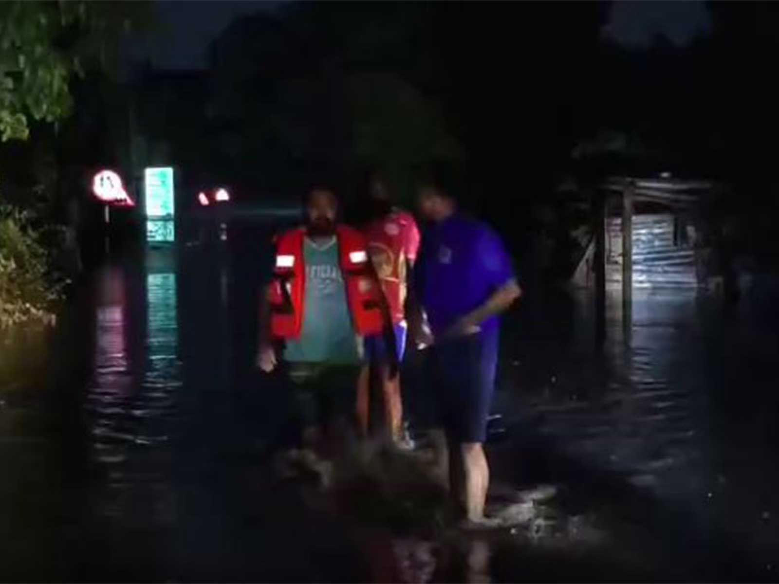 Fire Department rescues three from flood-hit Auranga River Crossing (Photo/ANI)
