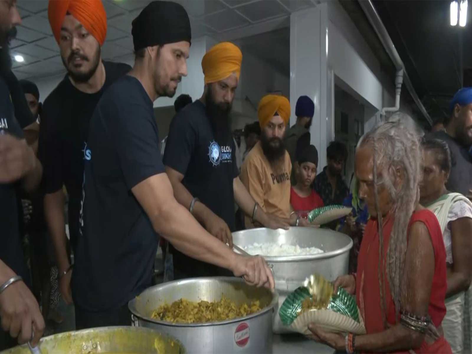 Randeep Hooda serves Langar at Sivasagar railway station in Assam (Photo/ANI)