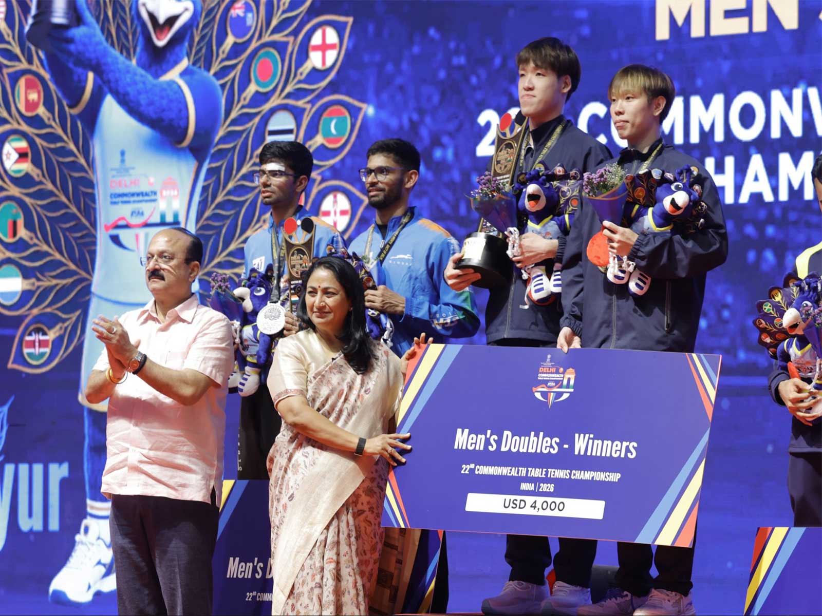 Delhi CM Rekha Gupta with the medal winners of Commonwealth Games Table Tennis Championship 2026 closing ceremony. (Photo: X/ @gupta_rekha)