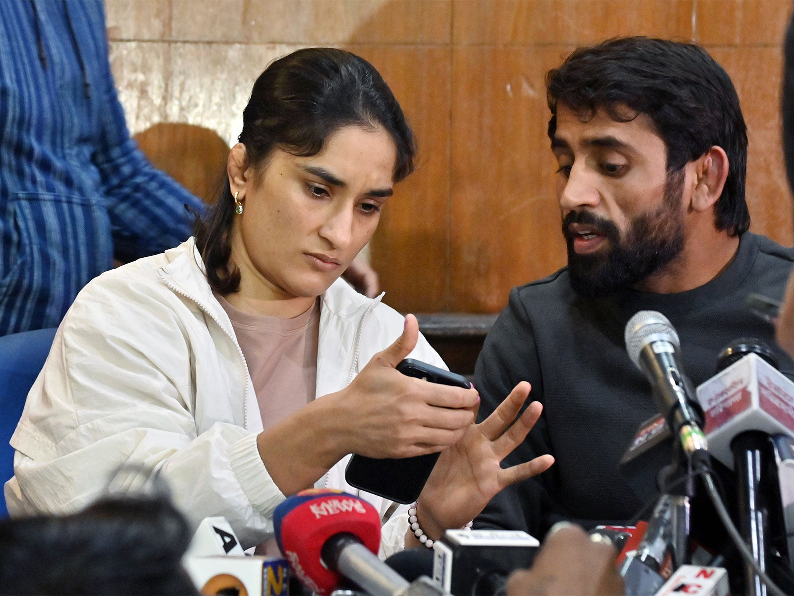Vinesh Phogat (L) and Bajrang Punia (R) during a press conference (File Photo/ANI)