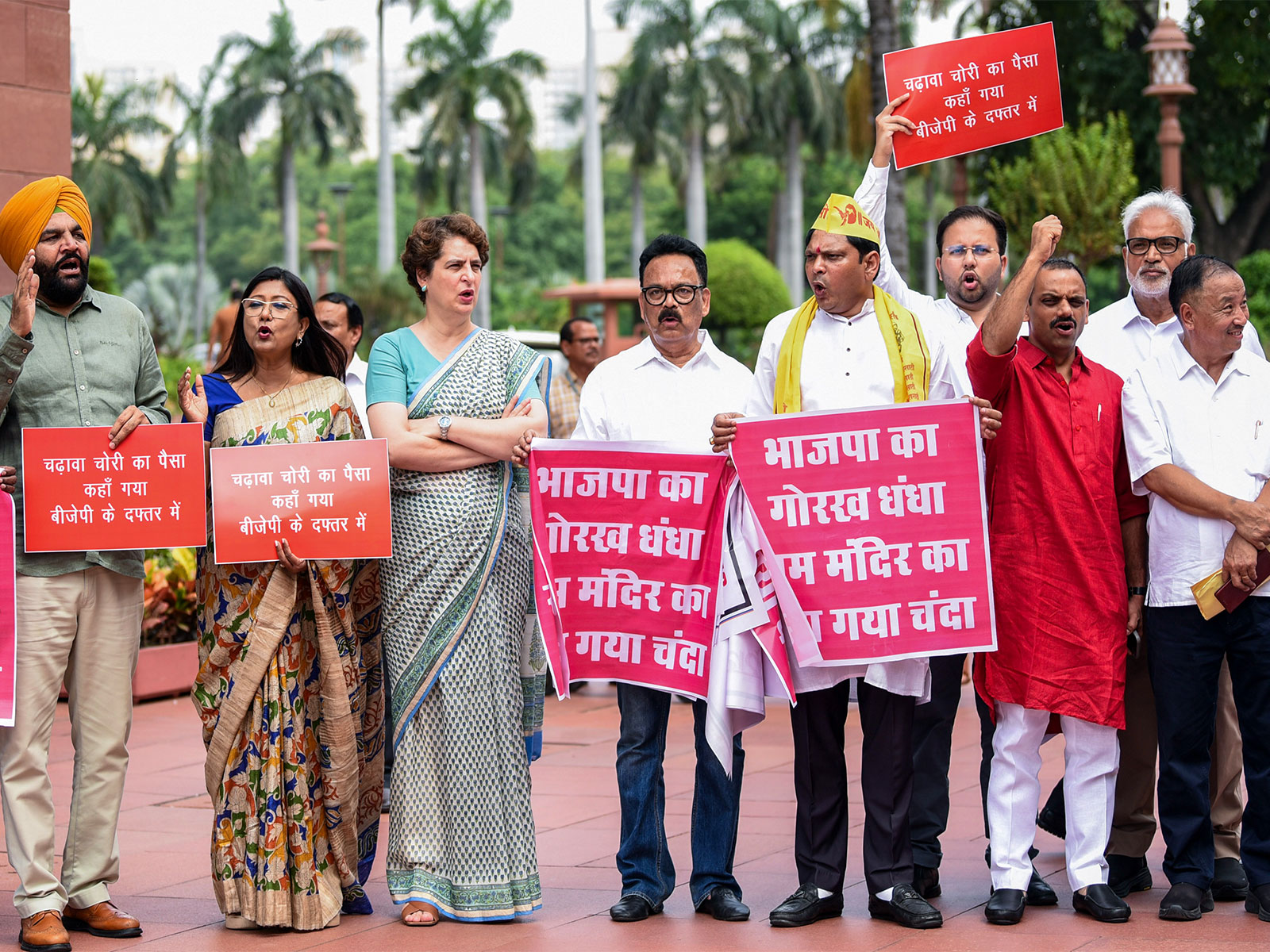 Opposition MPs protest over the issue of alleged Ayodhya Ram Mandir donations embezzlement during the Parliament Monsoon Session (Photo/ANI) 