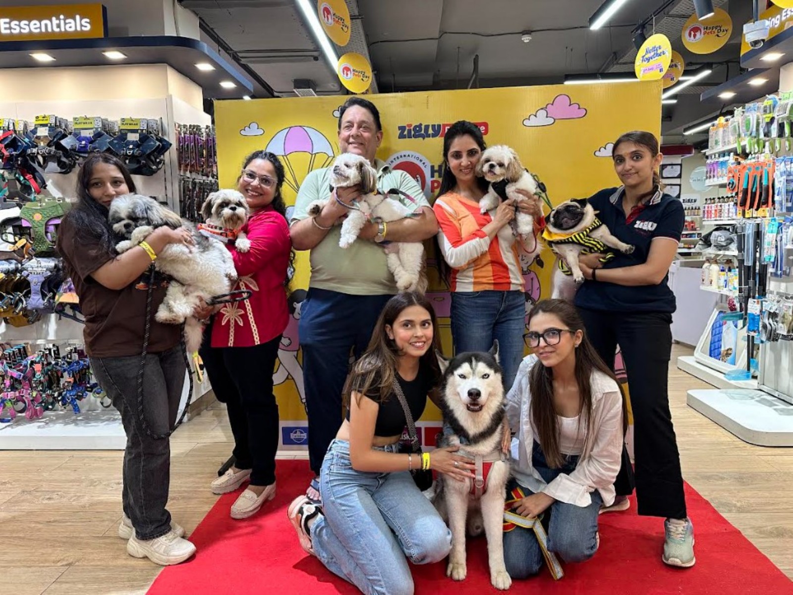 Pet parents with their furry companions at the IHPD 2026 celebrations