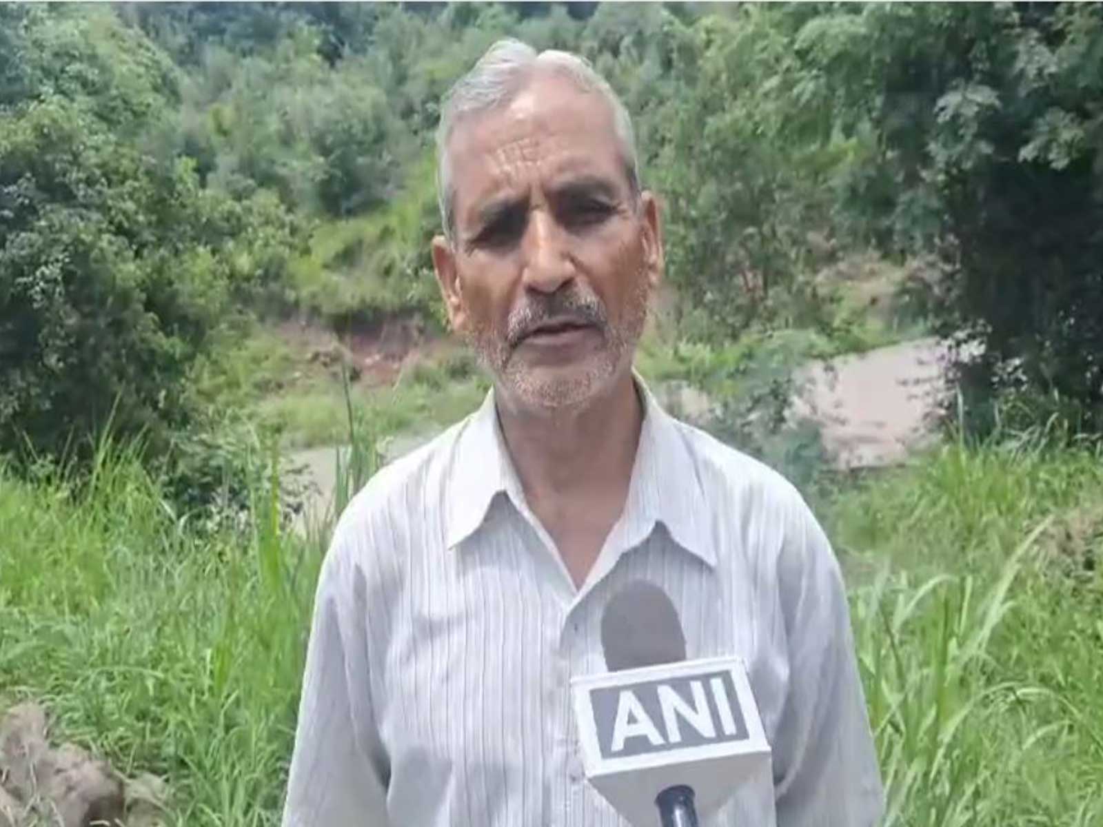 Flash floods triggered by heavy rainfall washes away crops and farmland in Rajouri, Jammu and Kashmir