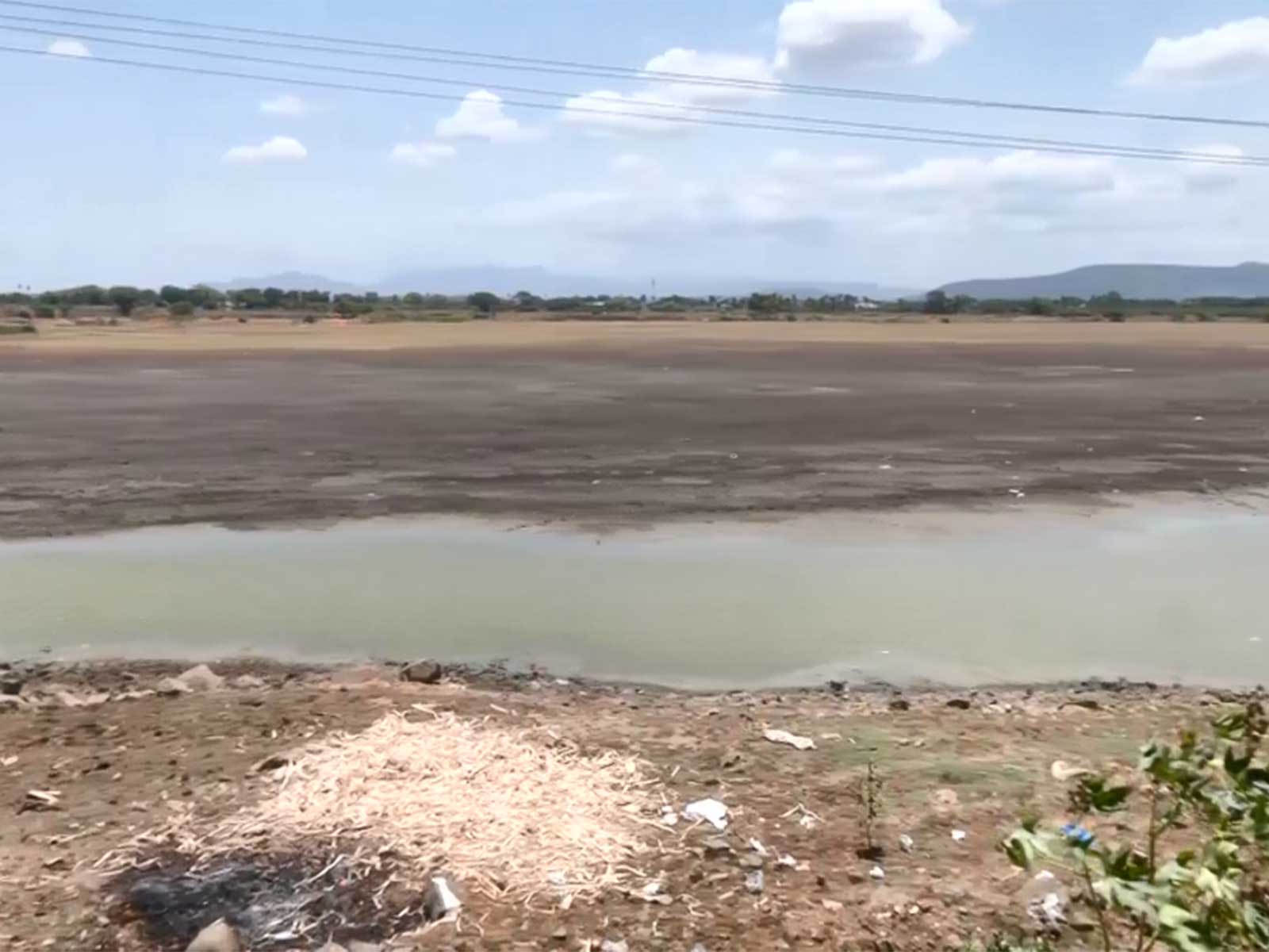 The dried-up Vellaripatti irrigation tank in Madurai, Tamil Nadu, amid severe water shortage. (Photo: ANI)