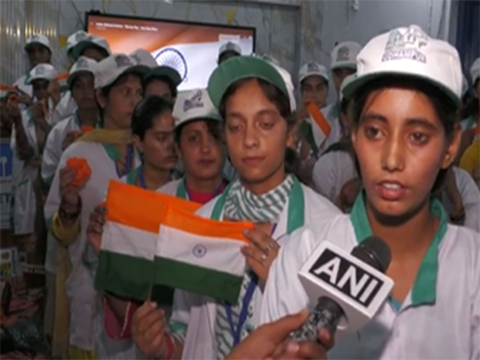 Women trainees stitch National Flags under the 'Har Ghar Tiranga' campaign in Udhampur. (Photo: ANI)