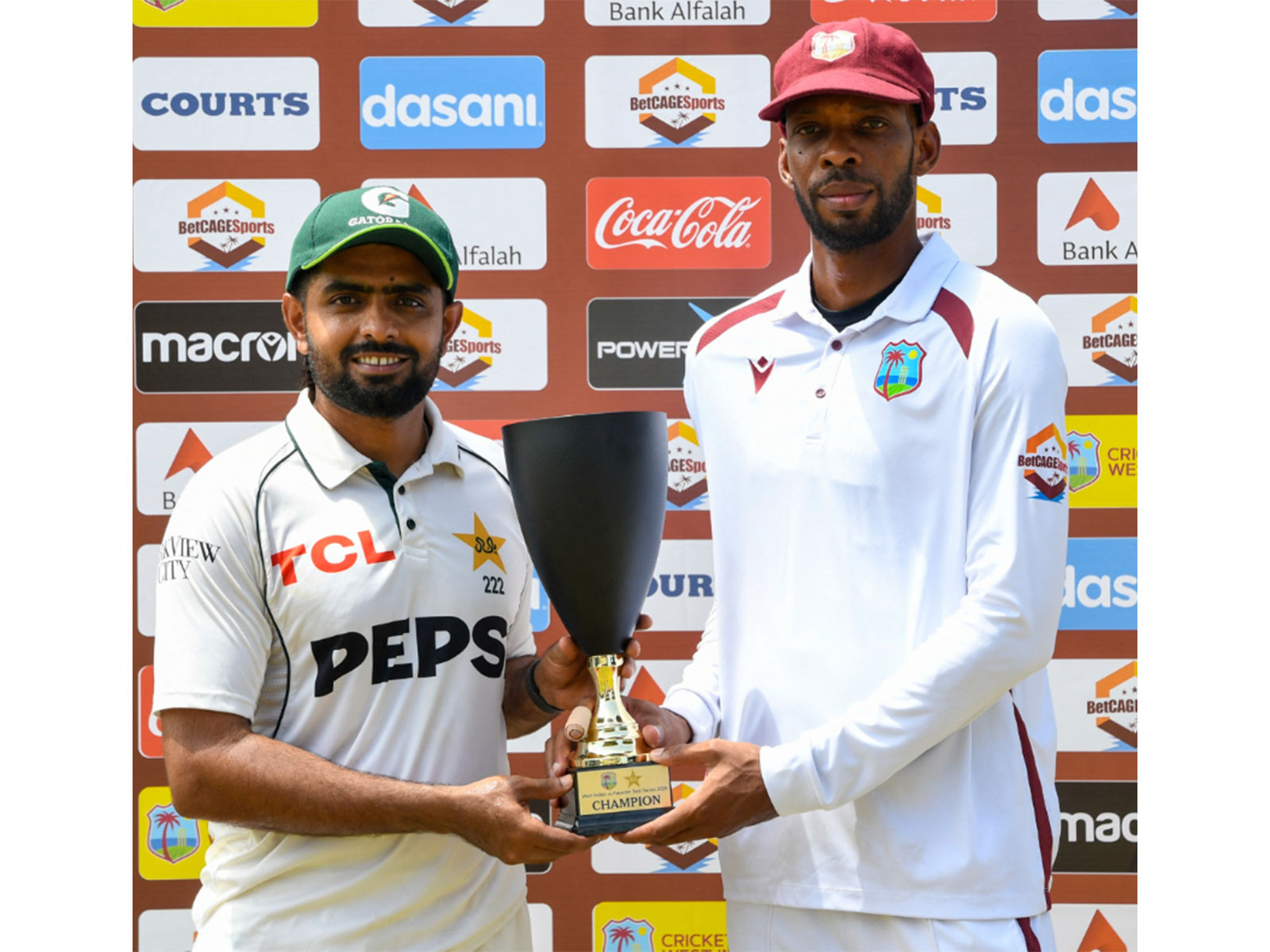West Indies captain Roston Chase (R) with Pakistan's Babar Azam (Photo: X/ @windiescricket)