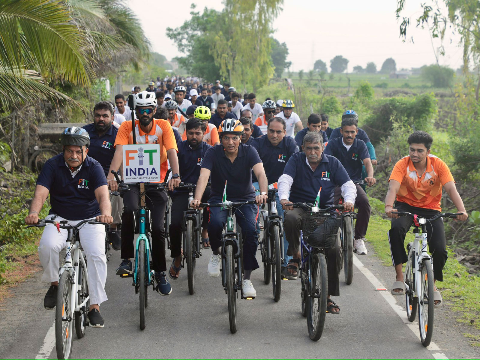Sports Minister Mansukh Mandaviya with cyclists at Hanol Village in Bhavnagar. (Photo: X/ @mansukhmandviya)