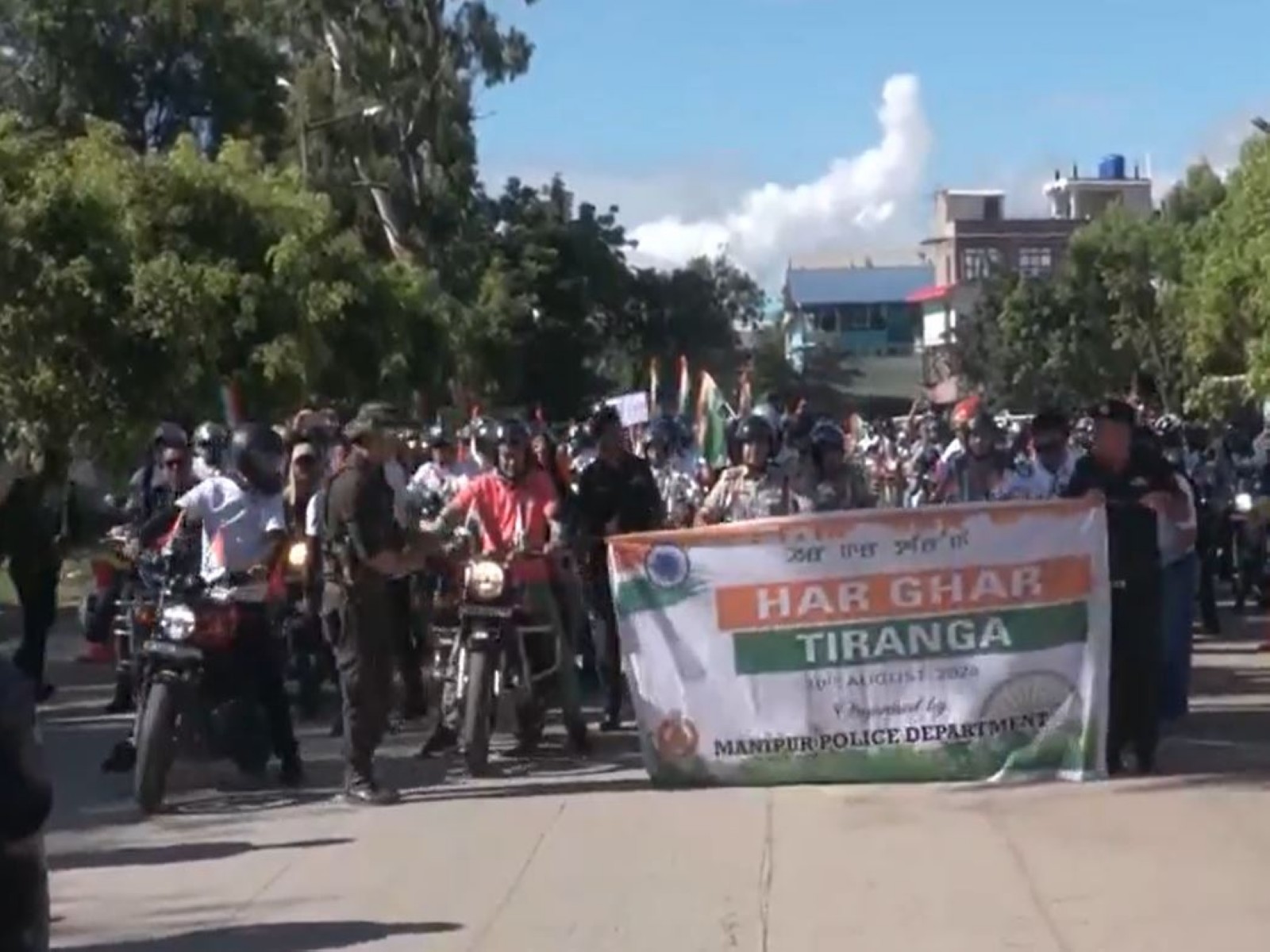 Participants take part in the 'Har Ghar Tiranga' bike rally in Imphal ahead of Independence Day. (Photo: ANI)