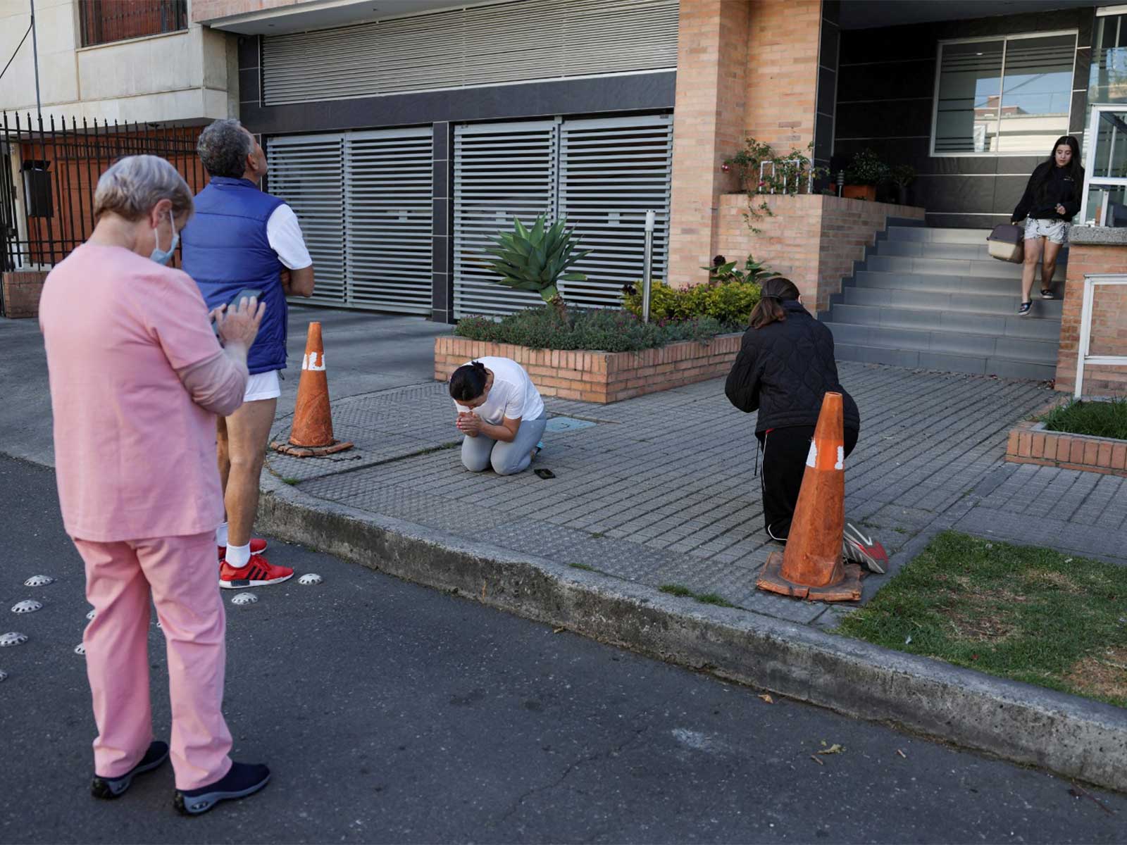 People gather outside a building following an earthquake in Bogota, Colombia (Photo/Reuters)