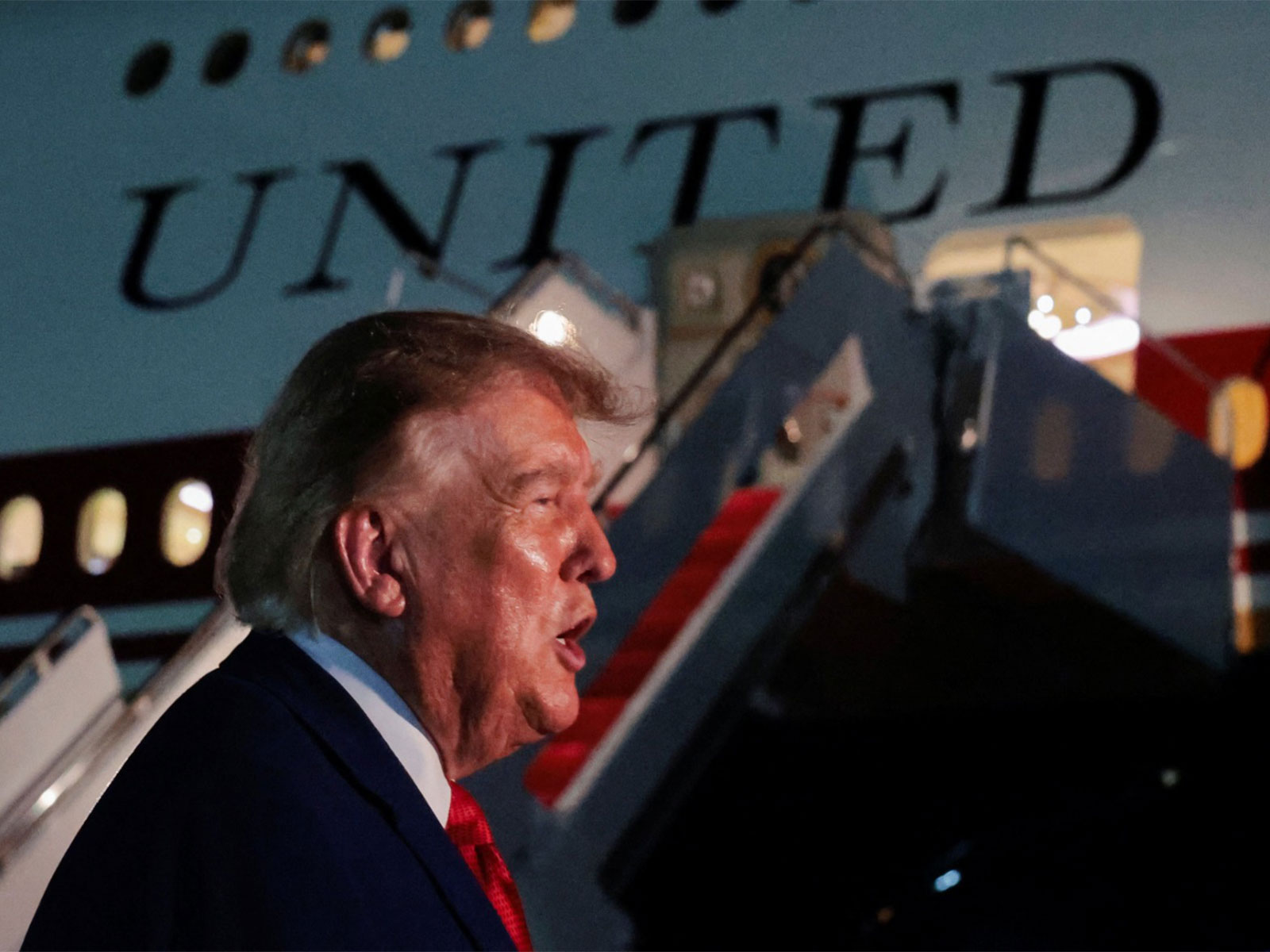 US President Donald Trump speaks to members of the media after disembarking Air Force One at Joint Base Andrews, Maryland (Photo/Reuters)