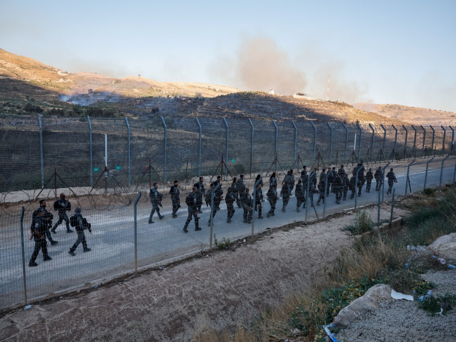 Israeli Border Police walk near the ceasefire line between the Israeli-occupied Golan Heights and Syria (File Photo/Reuters)