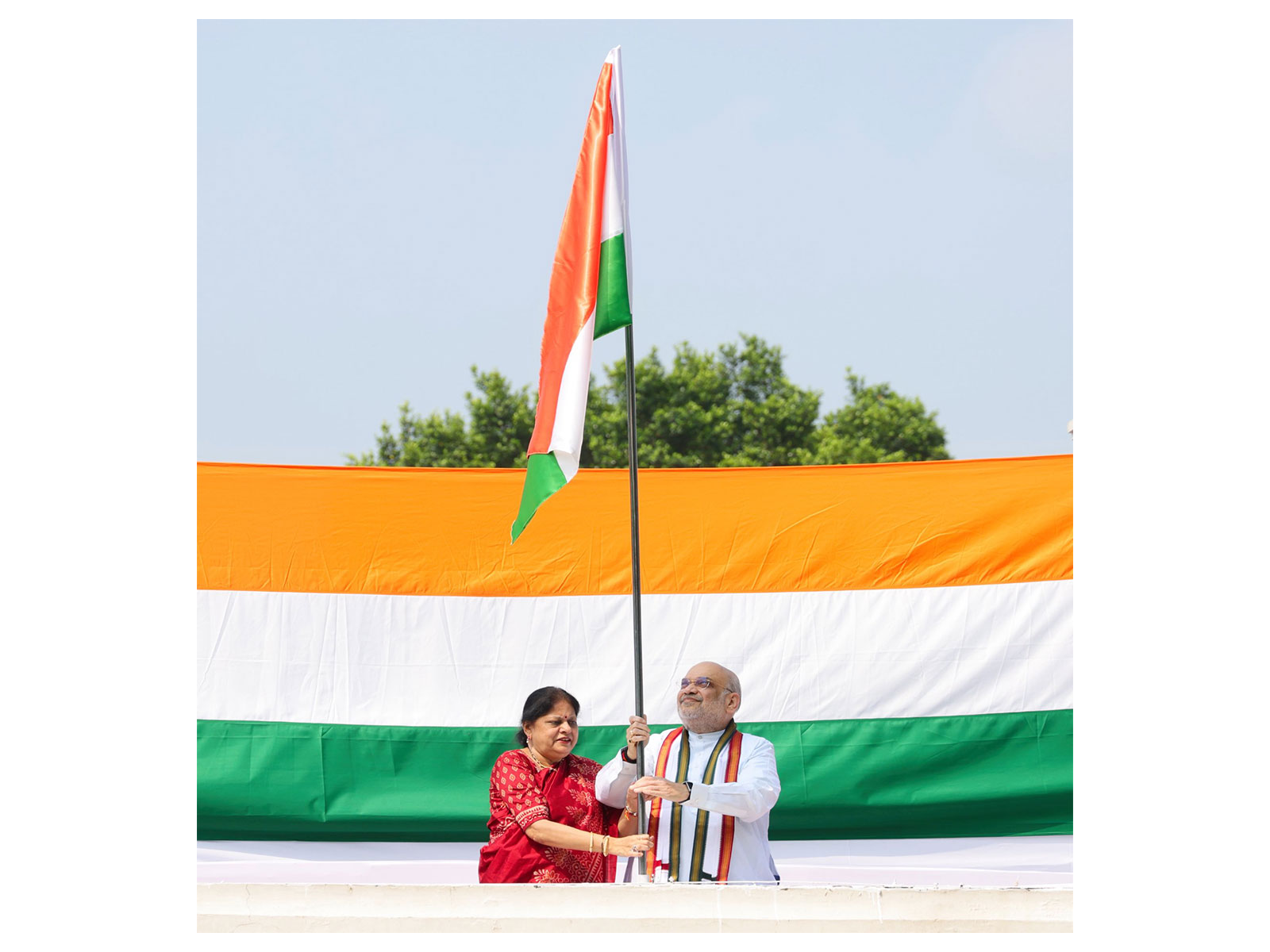 Union Minister Amit Shah hoists Tiranga flag at his residence (Photo/X/@AmitShah)