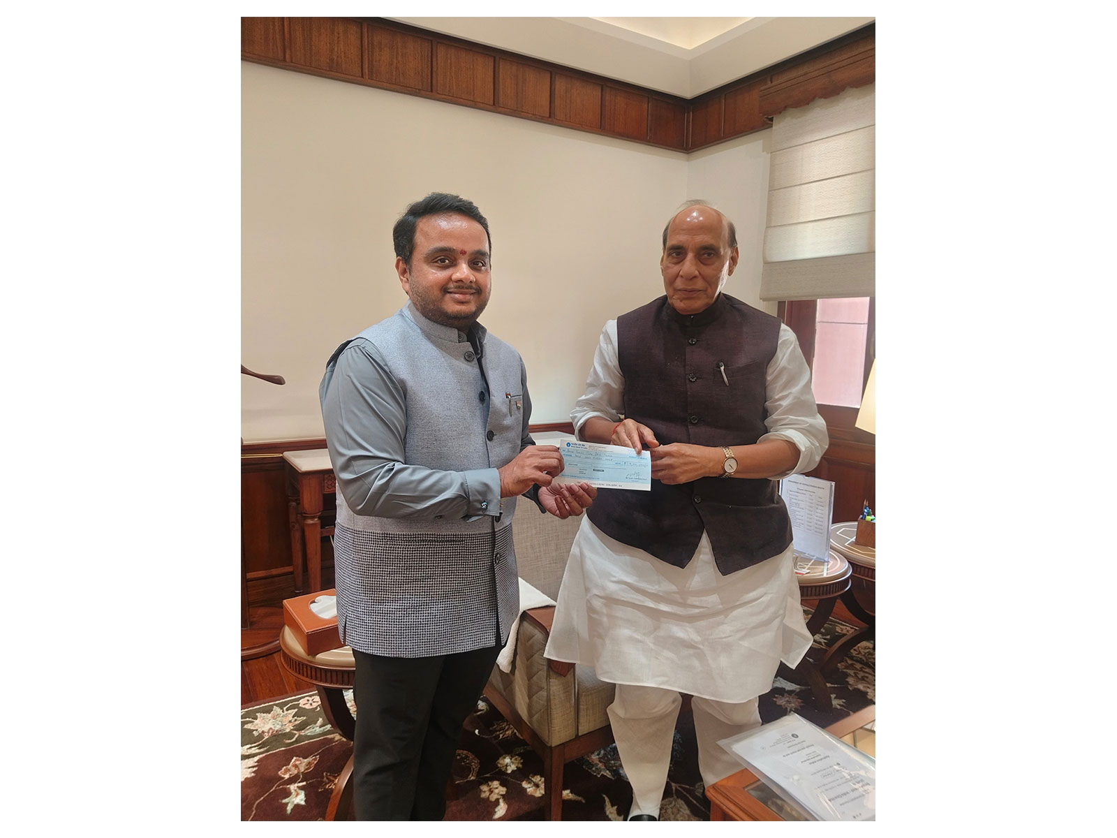 RS MP Vijay Chintakayala with Raksha Mantri Rajnath Singh (Photo/@vijaychinthak)