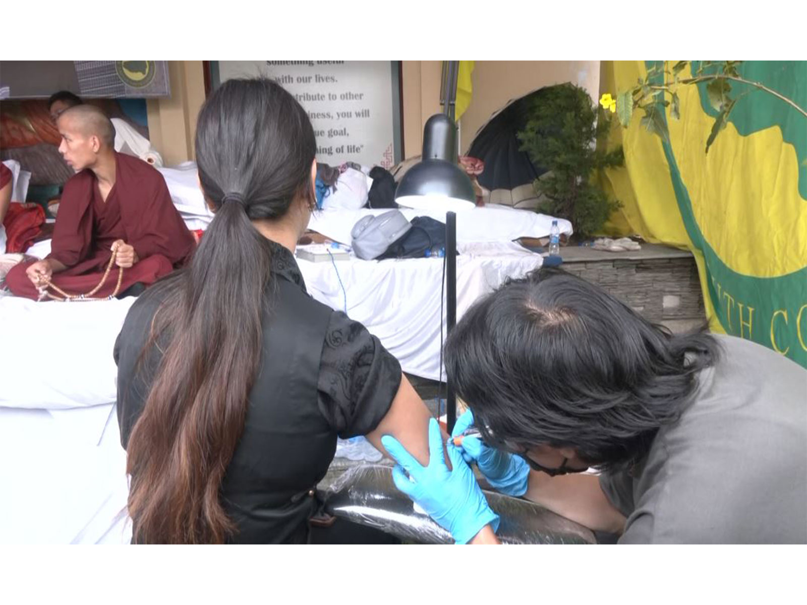 Tibetans hold tattoo protest against China's ethnic unity law (Photo/ANI)