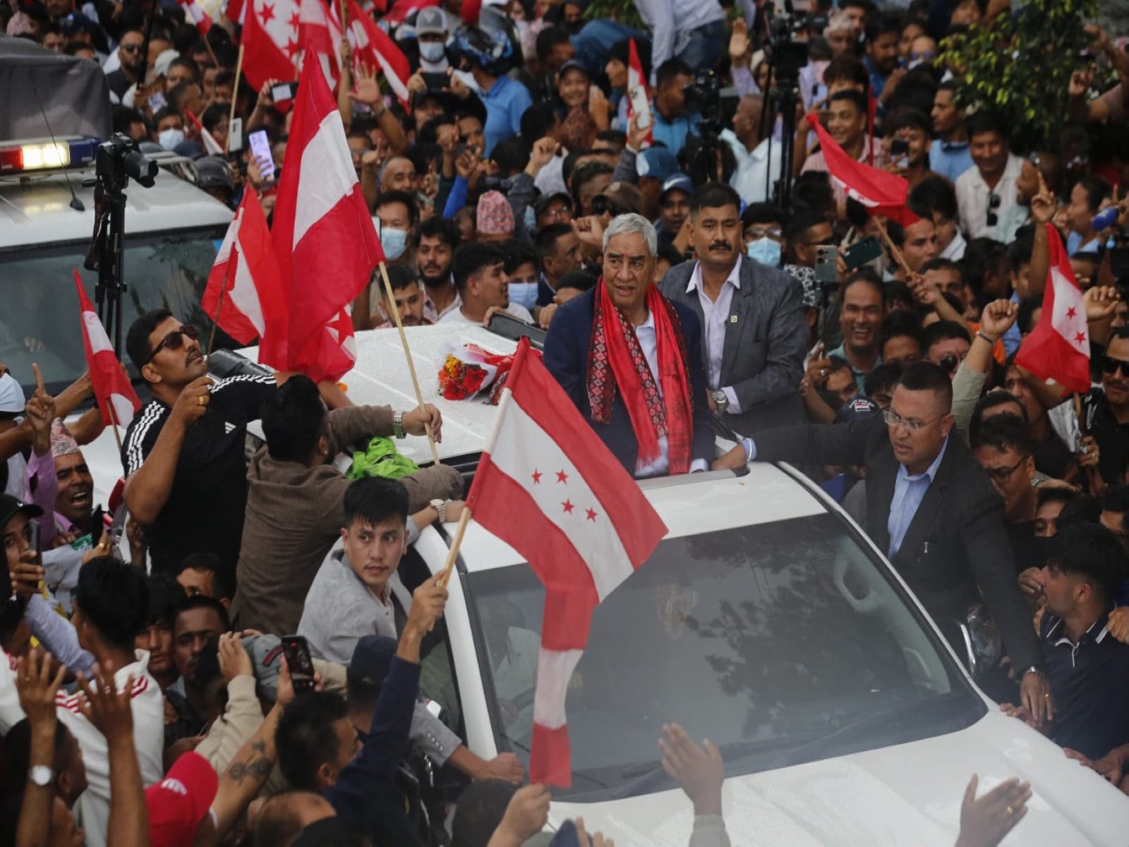 Nepal's ex-PM Deuba, beaten in Gen-Z protest, returns, receives grand welcome (Photo/ANI)
