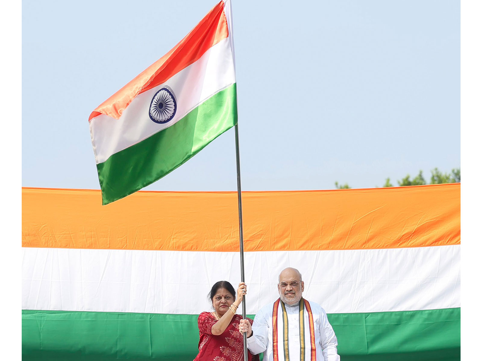 Union Minister Amit Shah hoists Tiranga flag at his residence (Photo/X/@AmitShah)