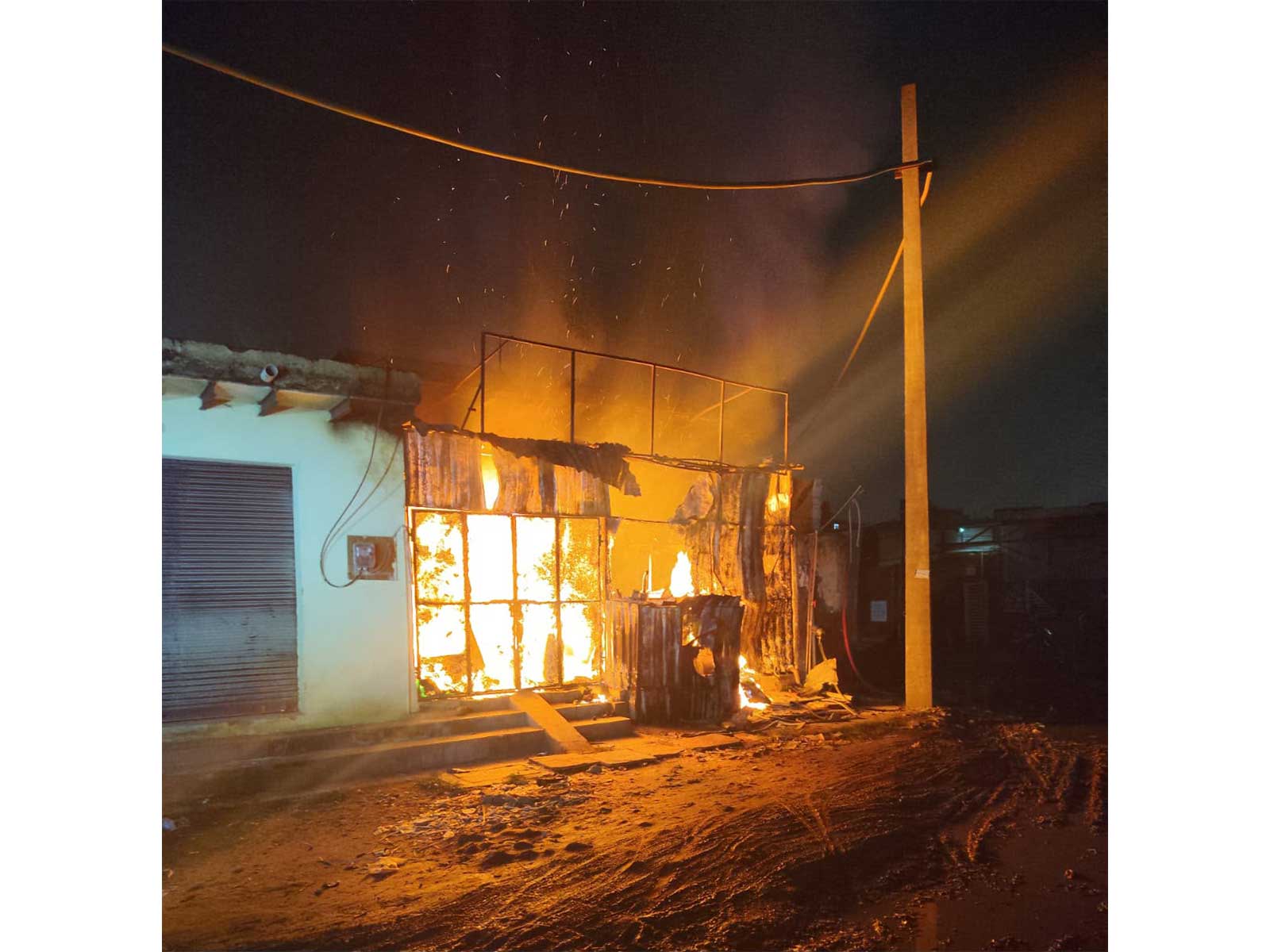 Fire broke out at a shop in Greater Noida West this morning (Photo/ANI)