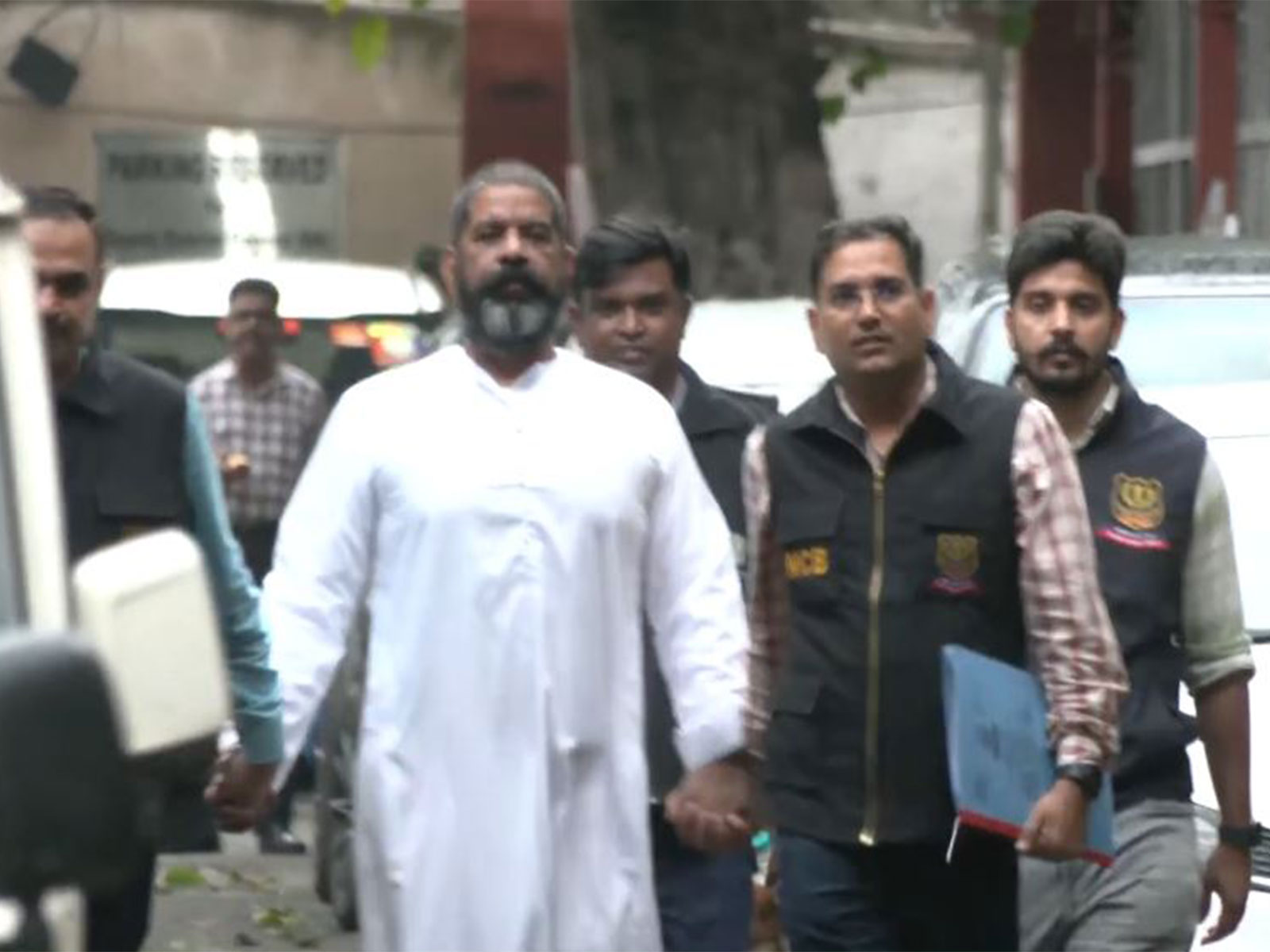 Virender Singh Basoya in NCB custody (Photo/ANI)