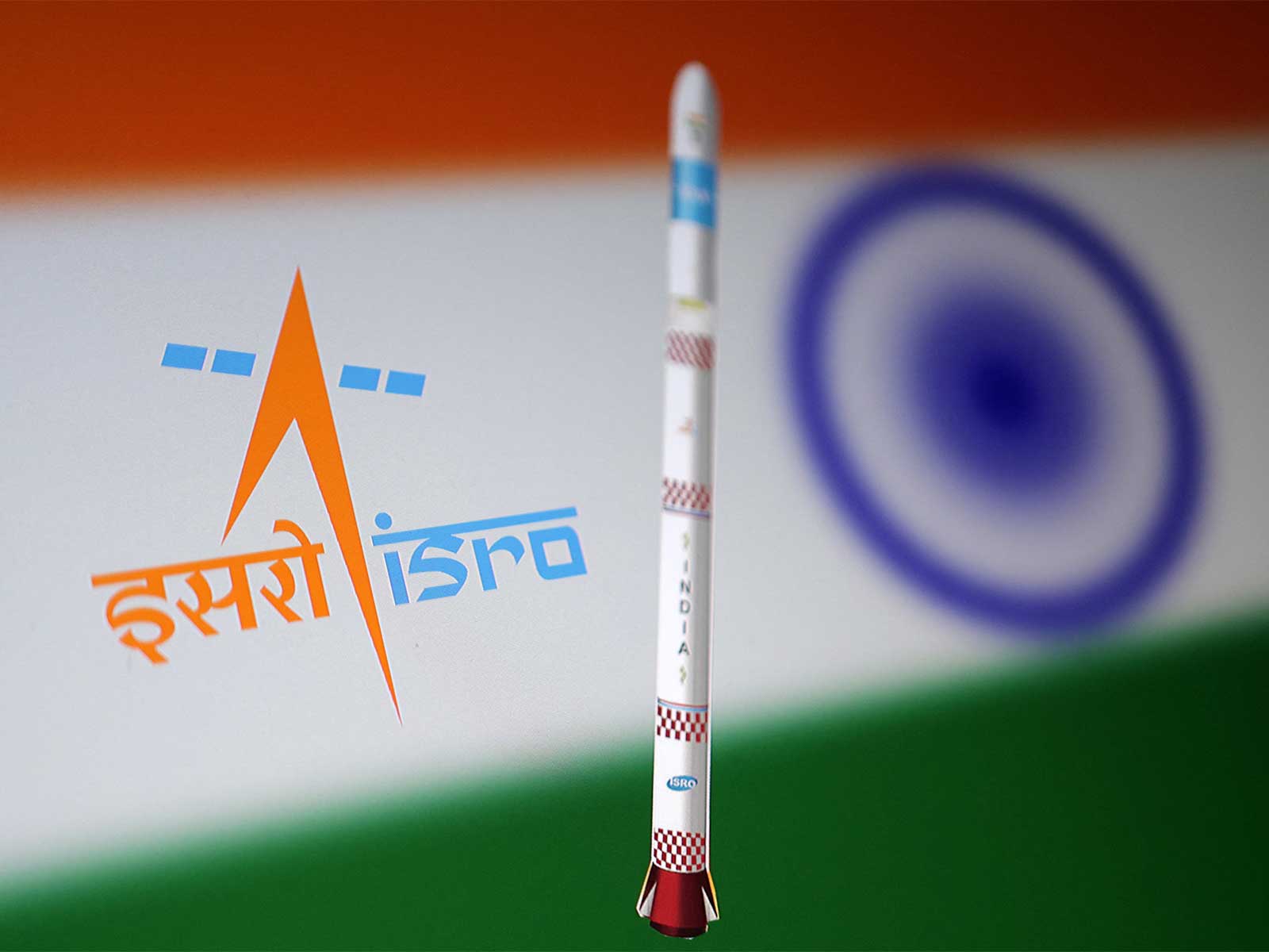 Small Satellite Launch Vehicle (SSLV), the Indian Space Research Organisation (ISRO) logo and the Indian flag are depicted in this illustration. (Photo/Reuters)