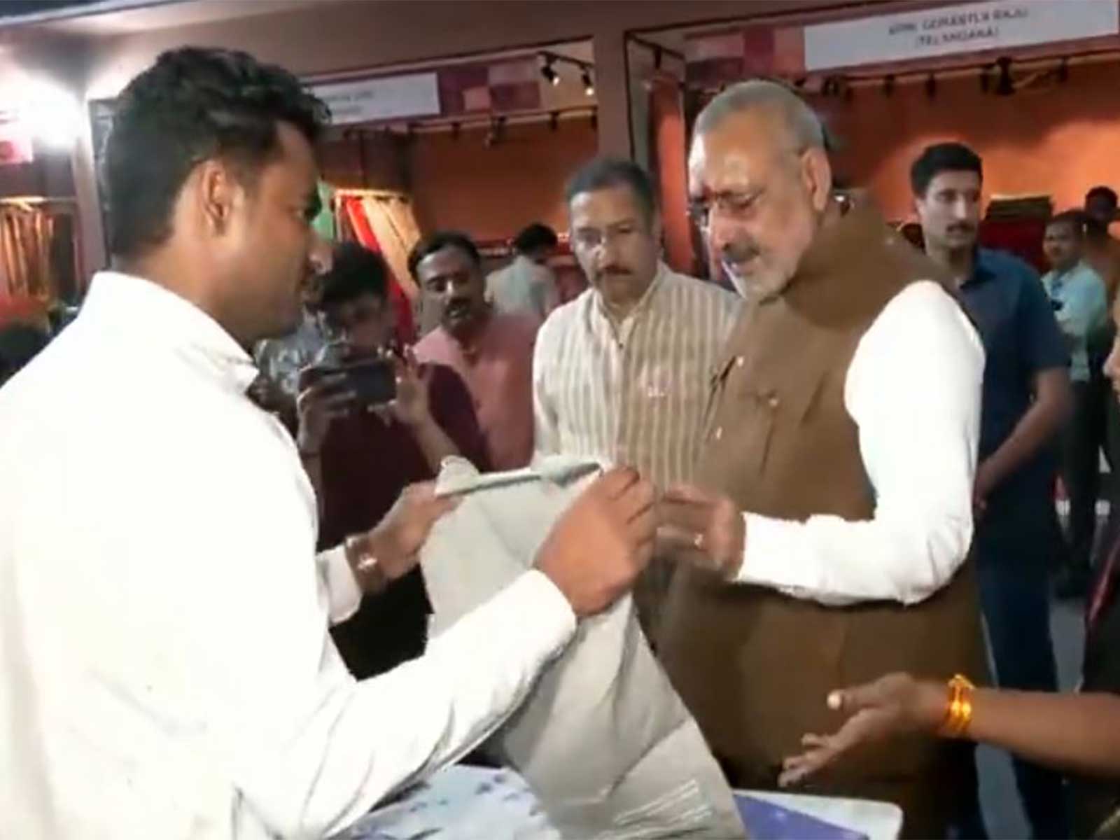 Union Minister Giriraj Singh interacts with weavers, artisans and designers during the inauguration of Handloom Haat at Janpath in New Delhi. (Photo/ ANI)
