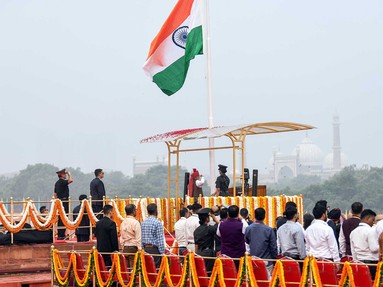 Prime Minister Narendra Modi salutes after hoisting national flag at Red Fort on 80th Independence Day, in New Delhi (Photo/ANI)