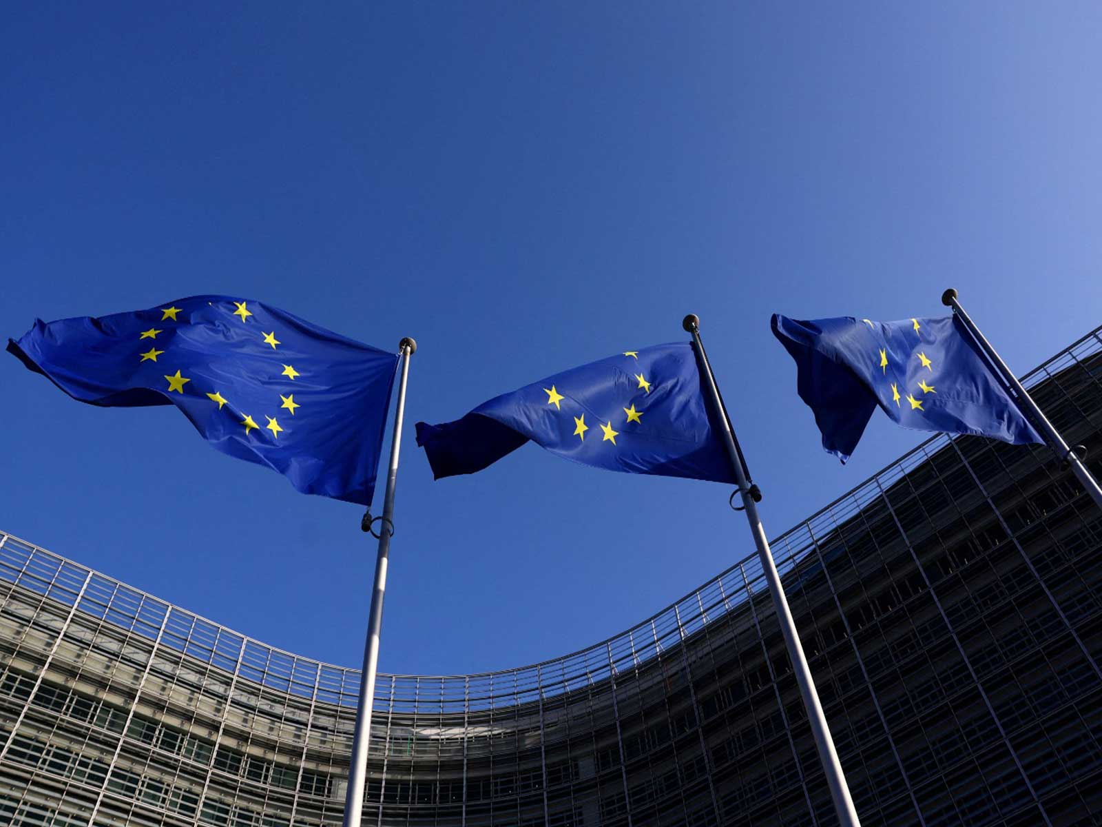 European Union flags flutter outside the European Commission headquarters in Brussels, Belgium (File Photo/Reuters)