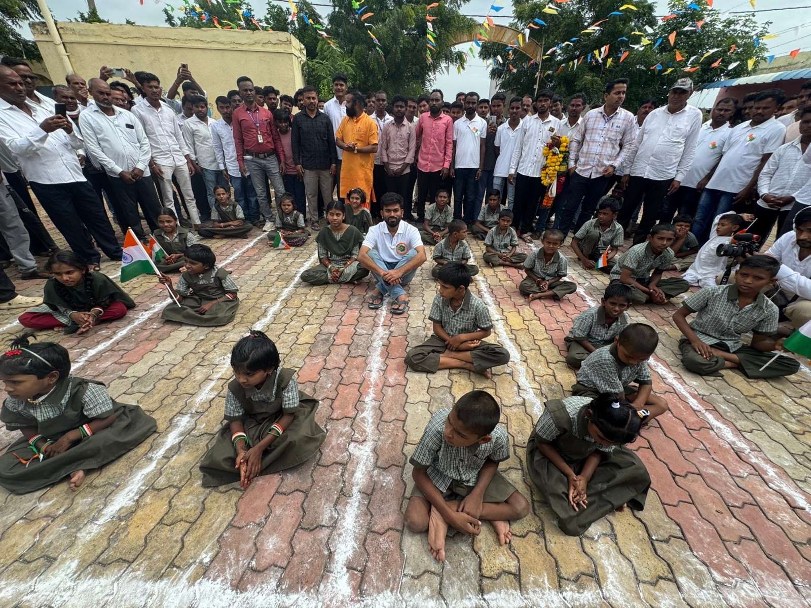 CJP founder Abhijeet Dipke with school students in Maharashtra (Photo/@abhijeet_dipke)