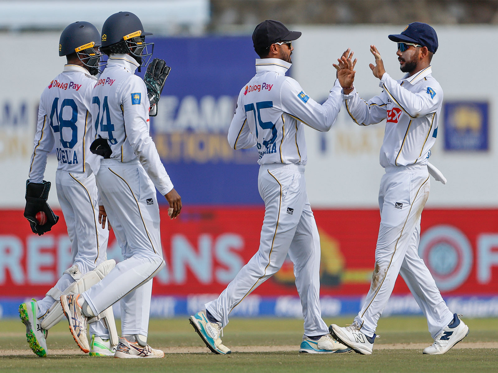 Sri Lankan players celebrating a wicket. (Photo: ANI)