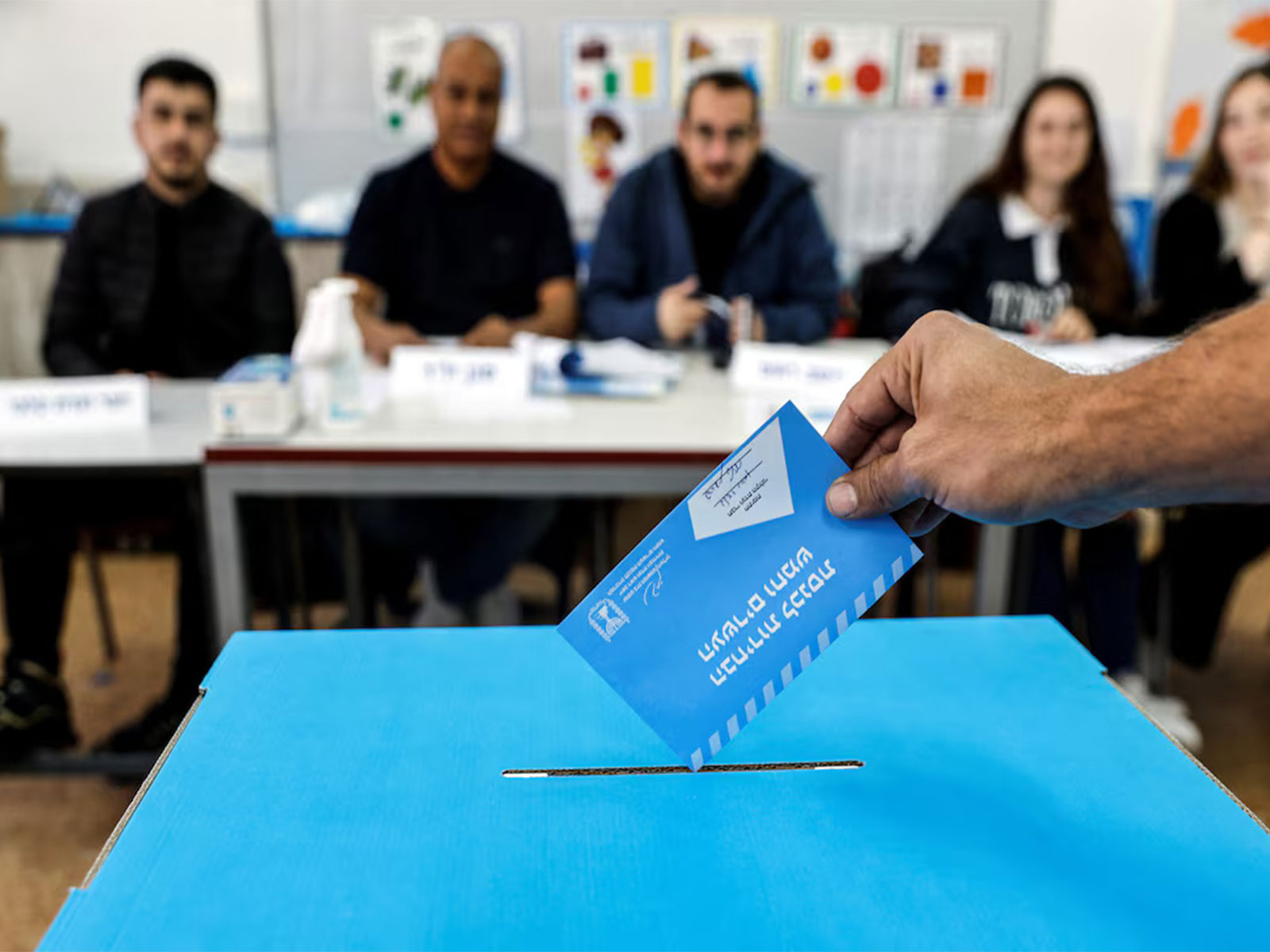 An Israeli man casts his vote at a polling station in Rahat during Israel's general election. (Photo/Reuters)