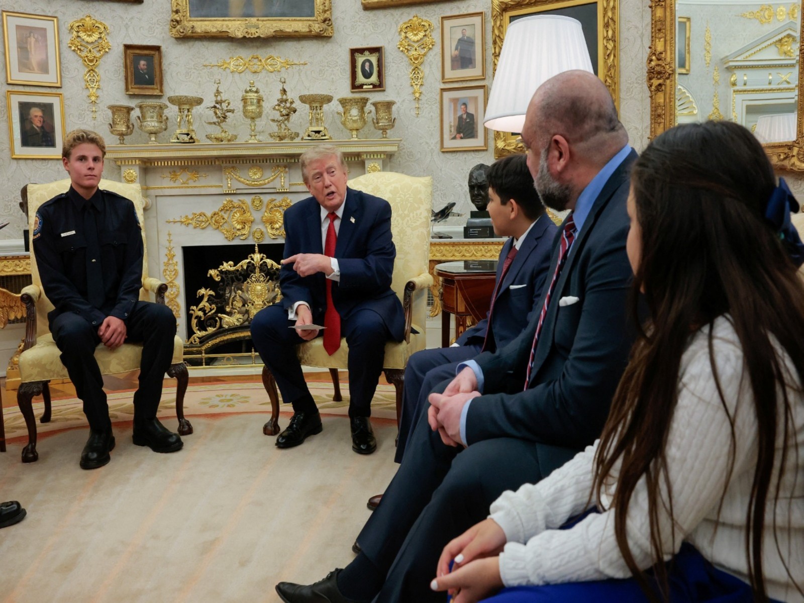 U.S. President Donald Trump hosts 16-year-old lifeguard Ryder Williams, who saved a child off the coast of Santa Cruz, California, last month (Photo/Reuters)