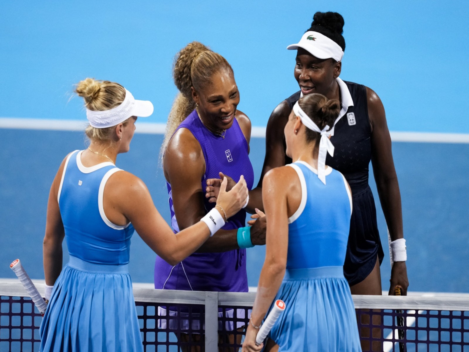 Aug 17, 2026; Mason, OH, USA; Serena Williams and Venus Williams of the United States meet with Peyton Stearns of the United States and Marta Kostyuk of Ukraine, after their doubles . (Photo: Reuters)