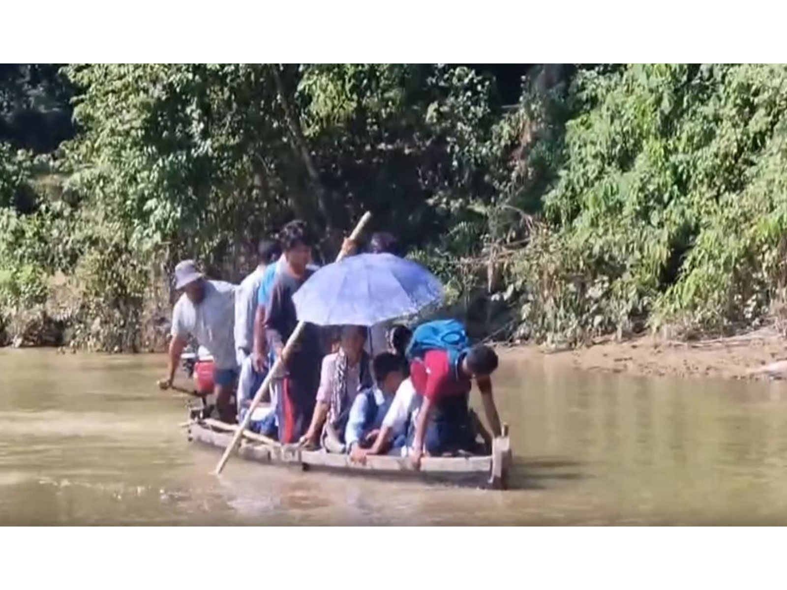 Students cross Kemi River by boats to reach school (Photo/ANI)