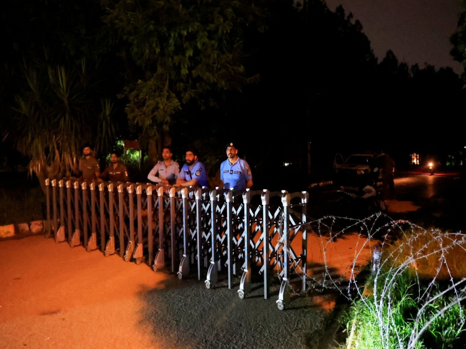 Police officers block off access to a road leading to Shifa International Hospital (Photo/Reuters)