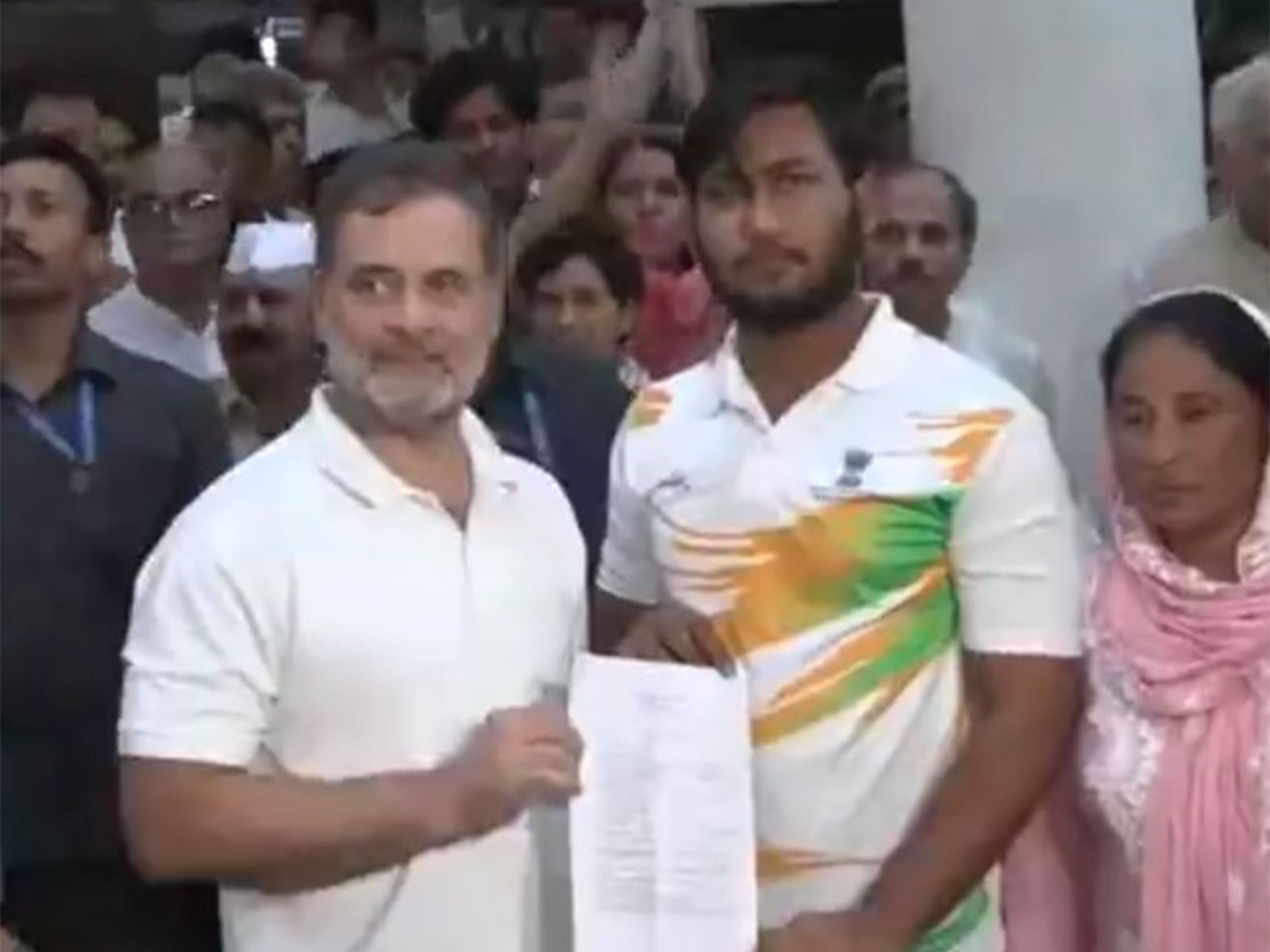 Rahul Gandhi with pellet gun shelling victim Sahil Lochav (Photo/ANI) 