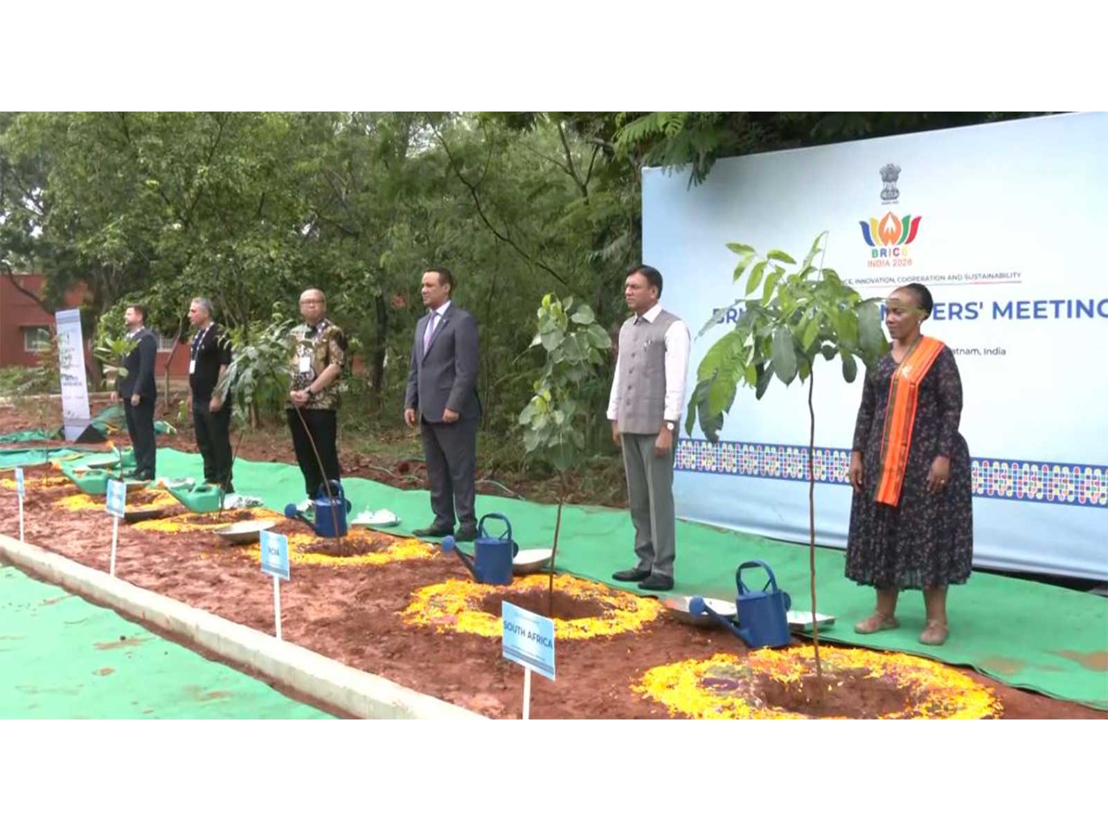   Union Minister Mansukh Mandaviya plants saplings with BRICS delegates (Photo/ANI)